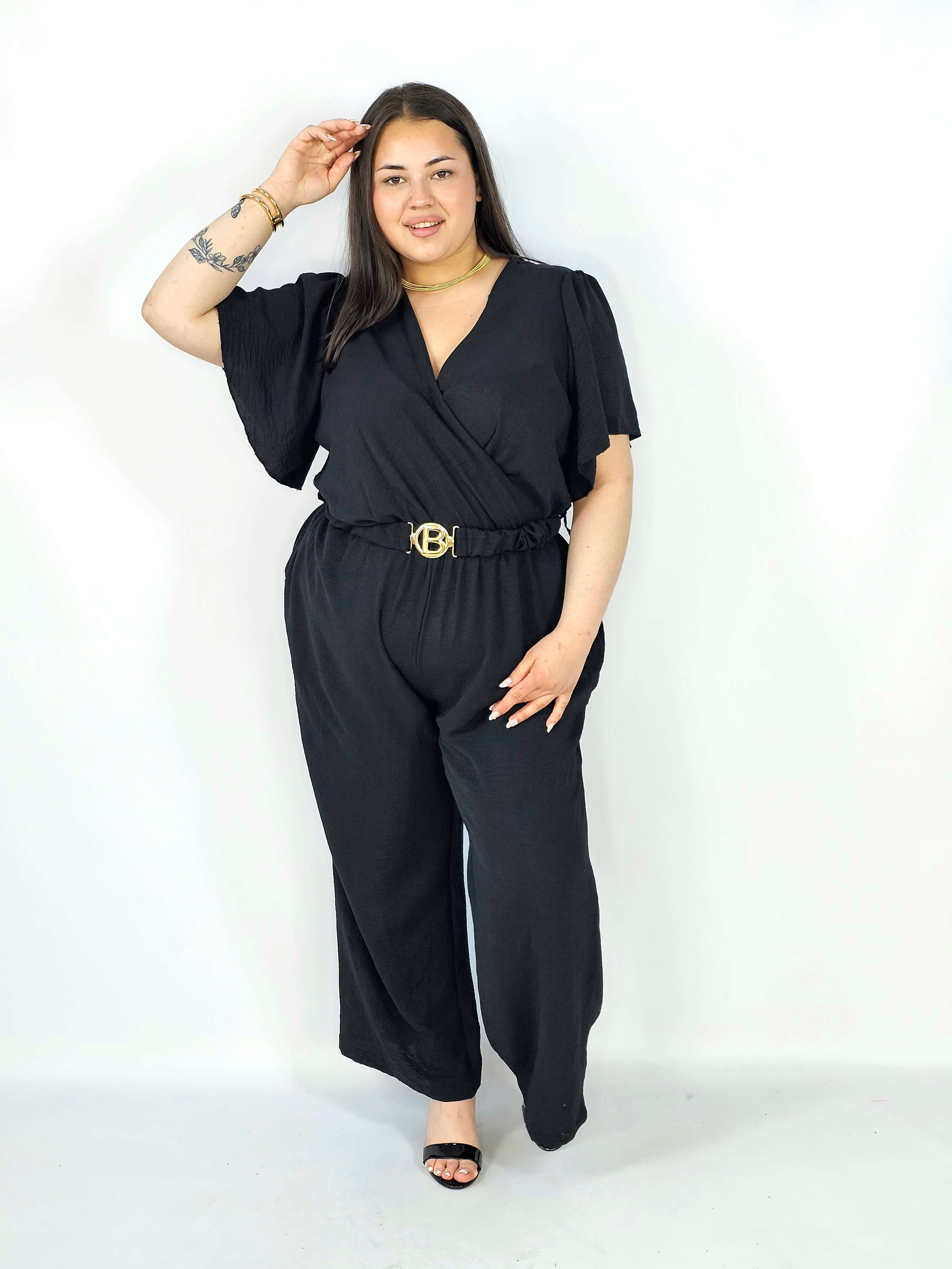 Kombinezon plus size z kopertowym dekoltem i paskiem – wygoda i styl XXL Stylowa XL