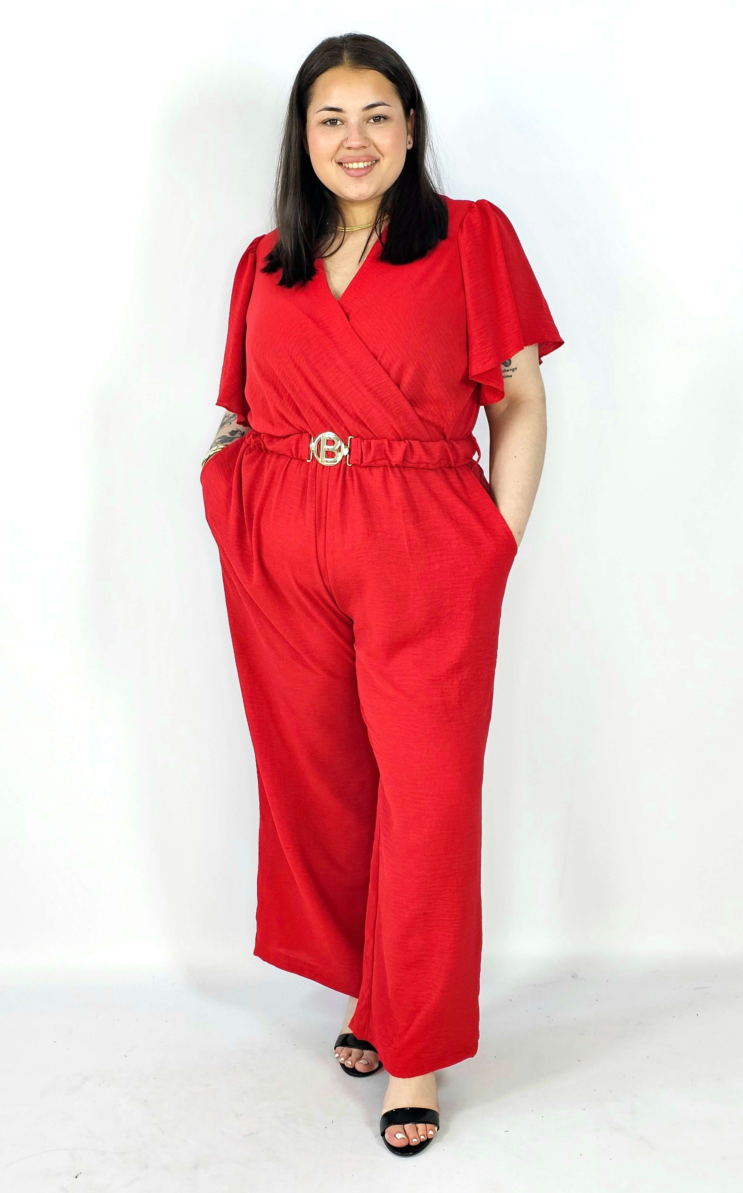Kombinezon plus size z kopertowym dekoltem i paskiem – wygoda i styl XXL Stylowa XL