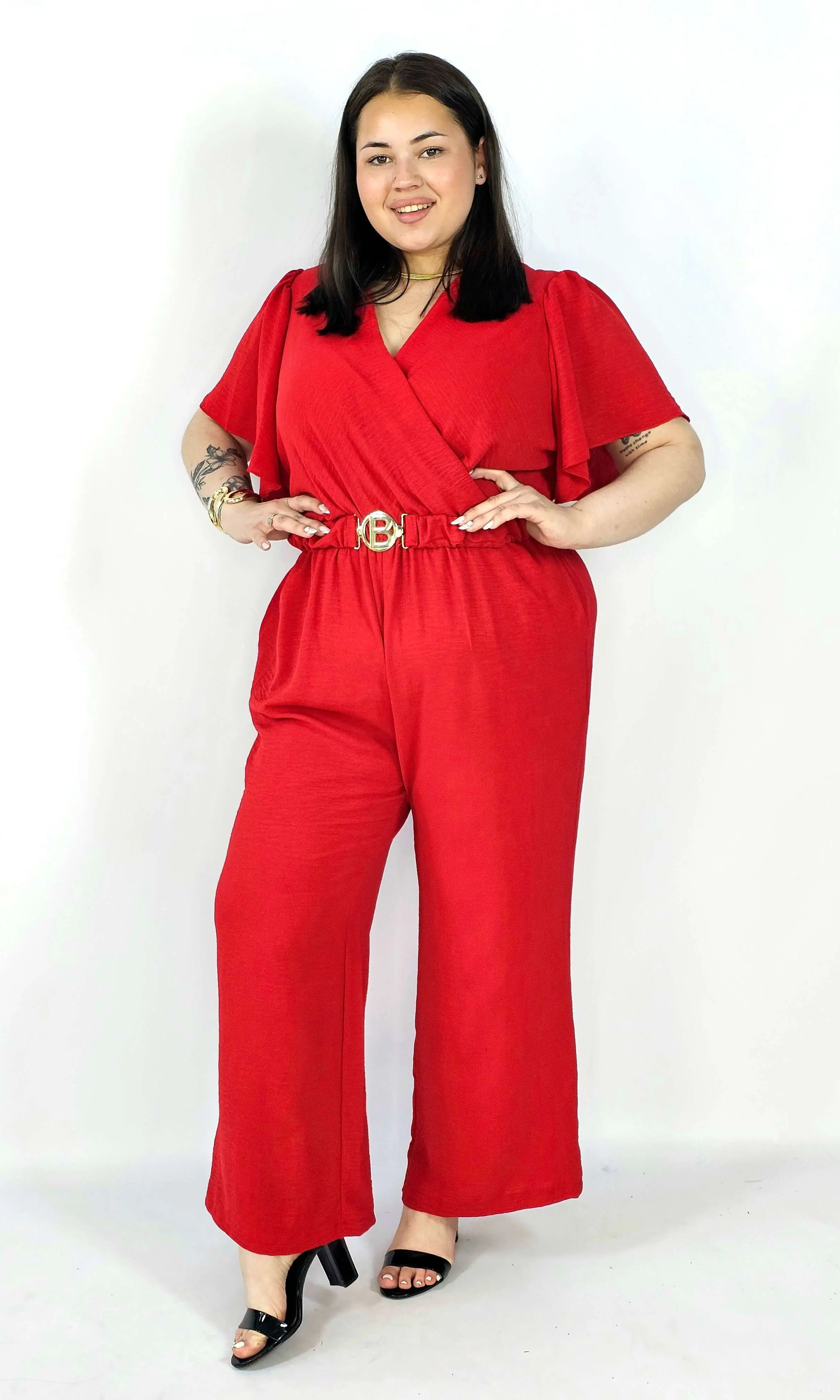 Kombinezon plus size z kopertowym dekoltem i paskiem – wygoda i styl XXL Stylowa XL