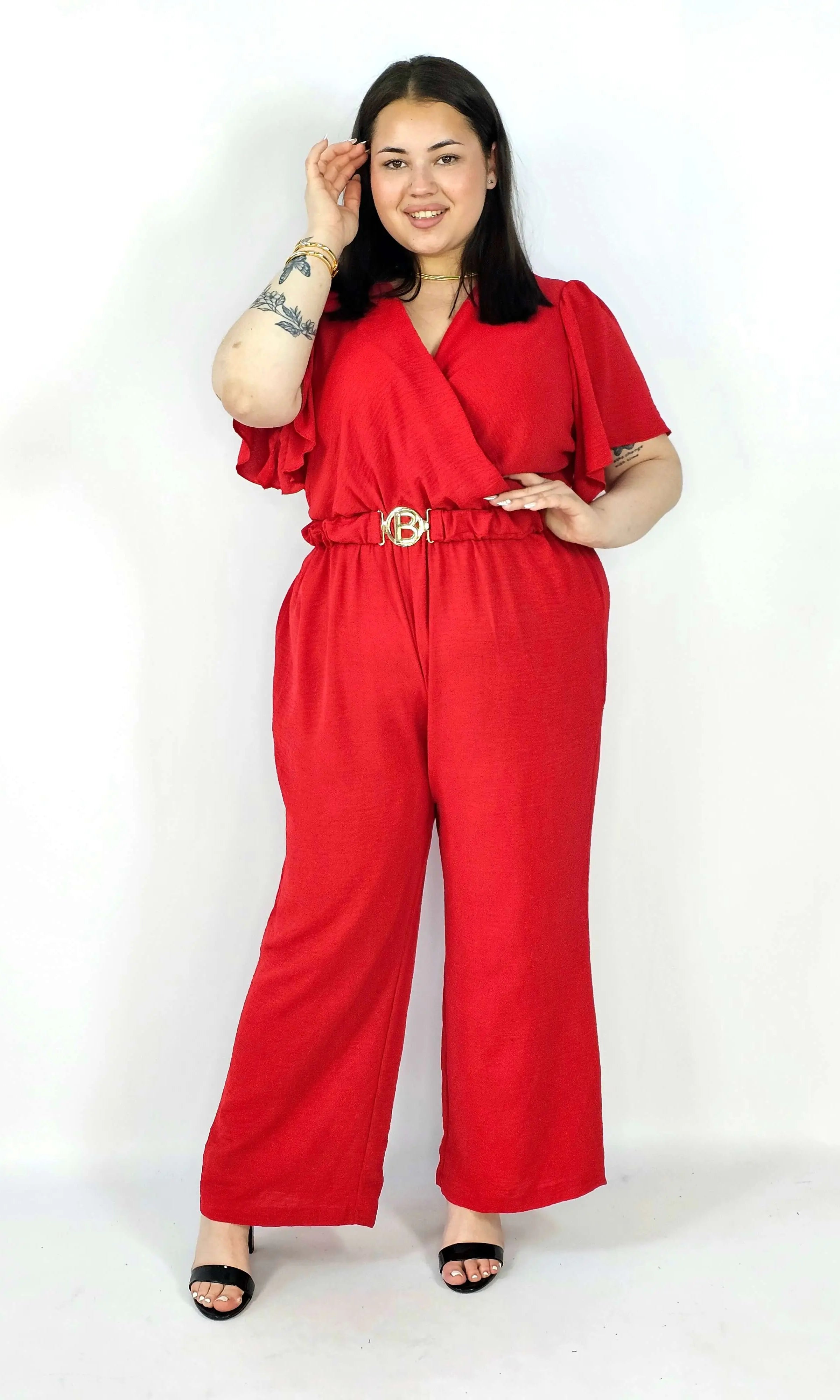 Kombinezon plus size z kopertowym dekoltem i paskiem – wygoda i styl XXL Stylowa XL