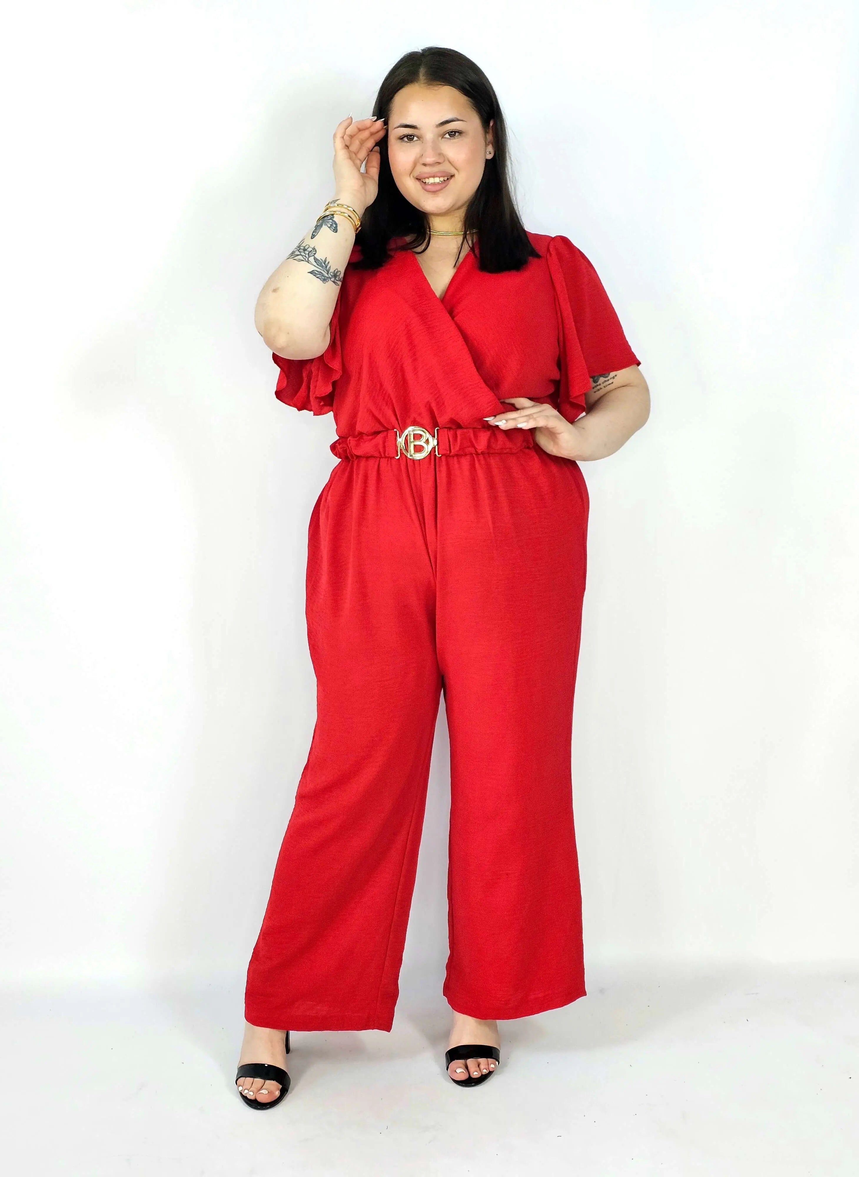 Kombinezon plus size z kopertowym dekoltem i paskiem – wygoda i styl XXL Stylowa XL