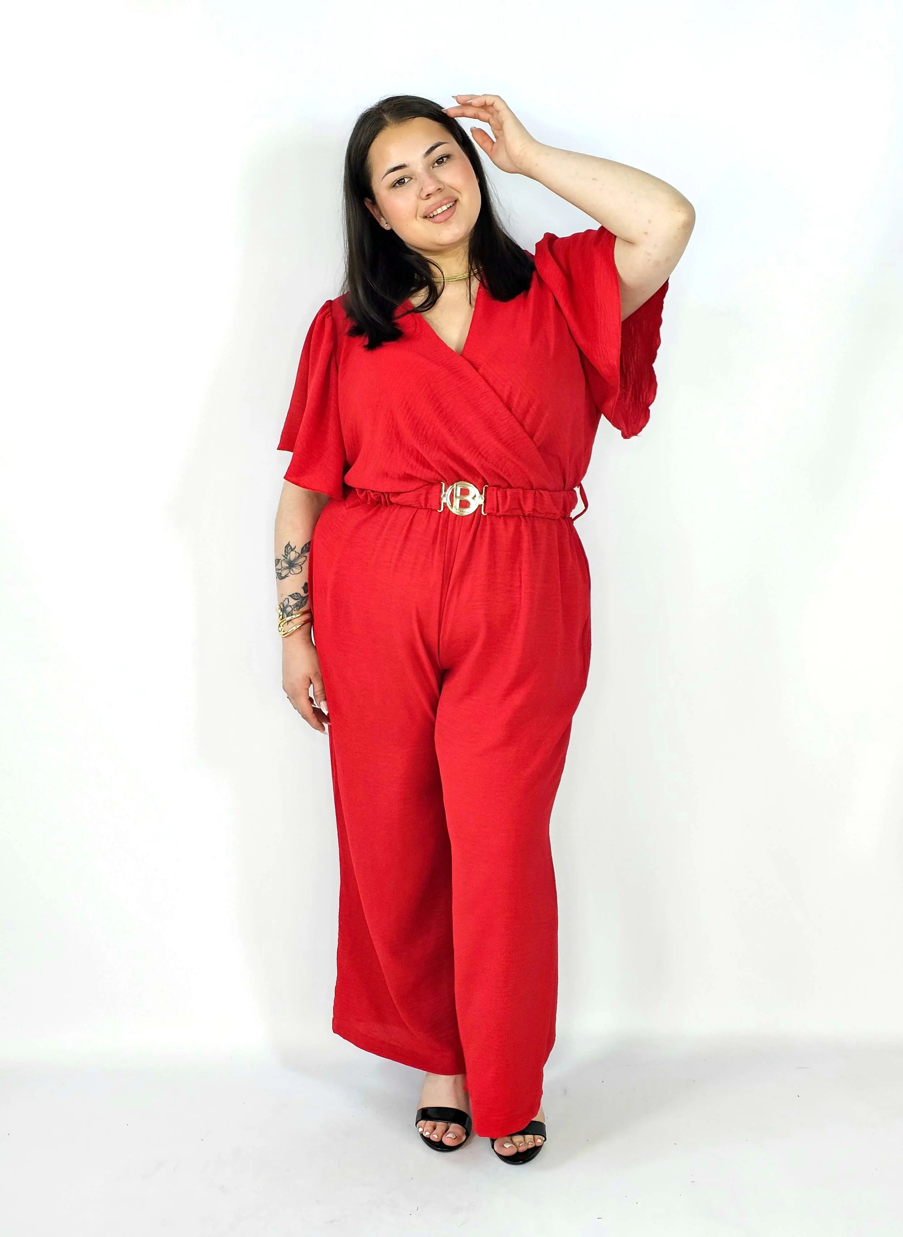 Kombinezon plus size z kopertowym dekoltem i paskiem – wygoda i styl XXL Stylowa XL