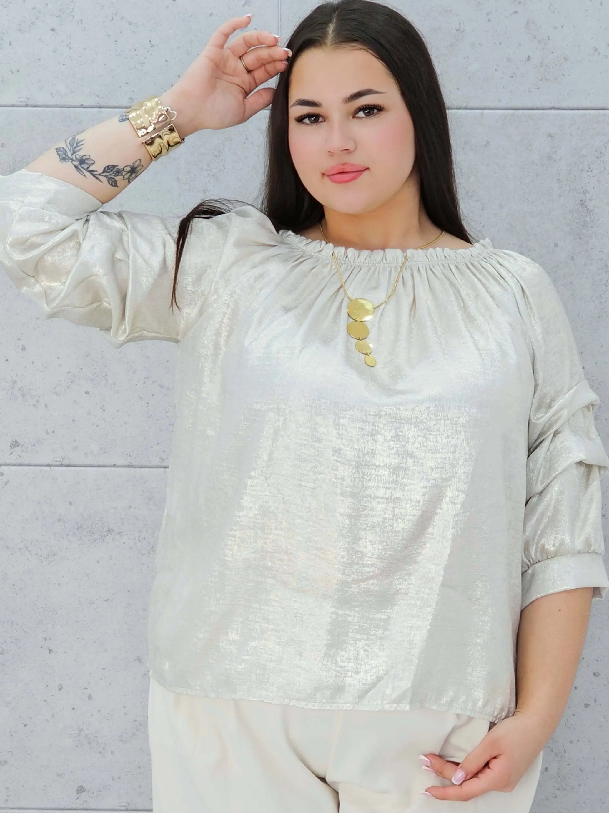 Kremowa bluzka z połyskiem Stylowa XL