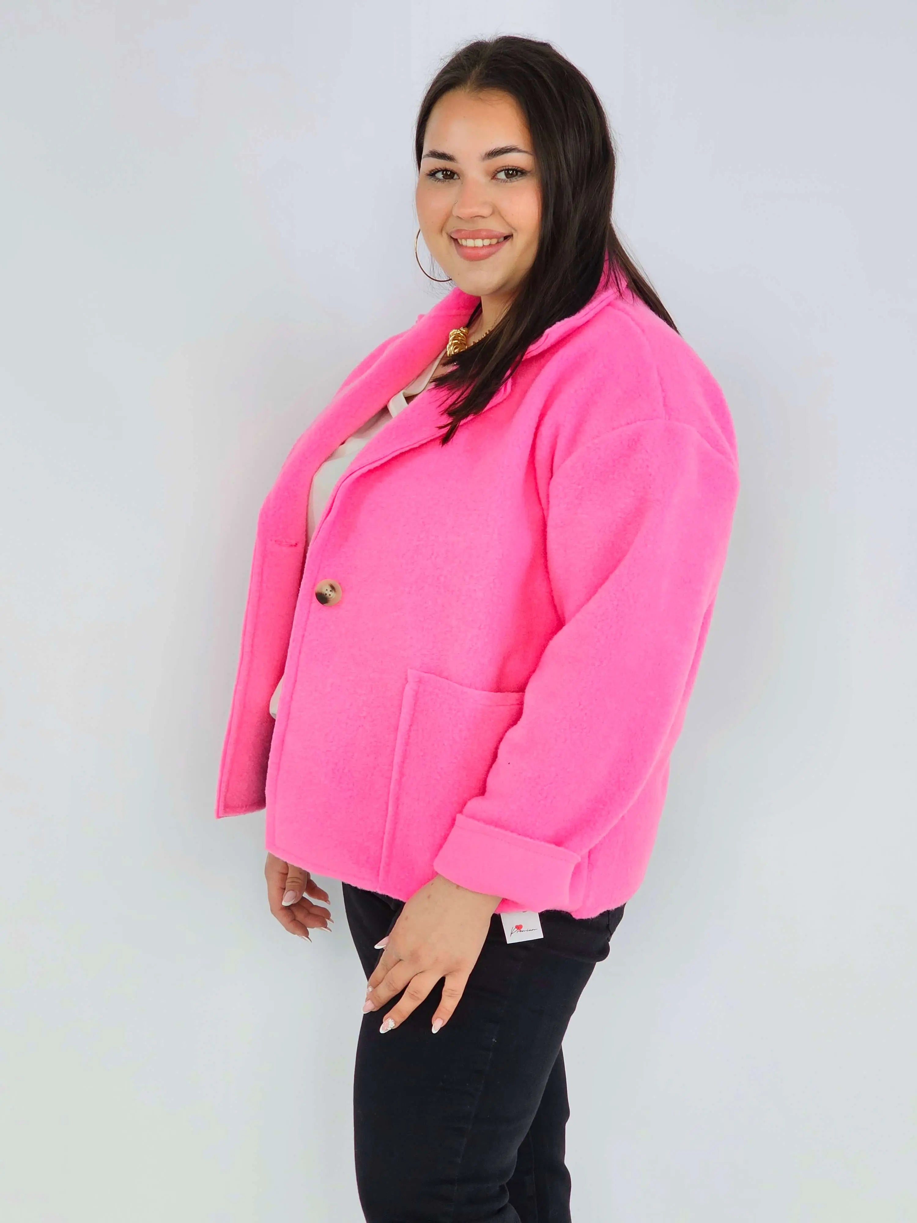 Kurtka plus size o krótkim kroju z kołnierzem i kieszeniami Stylowa XL