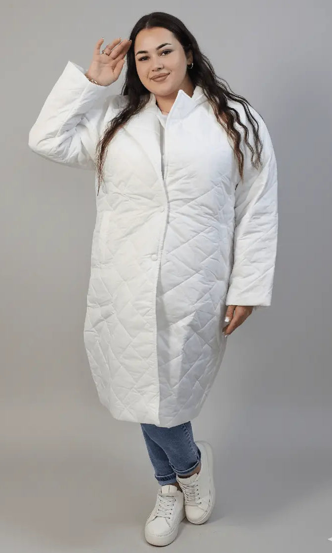 Kurtka plus size pikowana z dłuższym fasonem i kieszeniami Stylowa XL