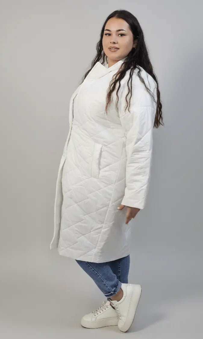 Kurtka plus size pikowana z dłuższym fasonem i kieszeniami Stylowa XL