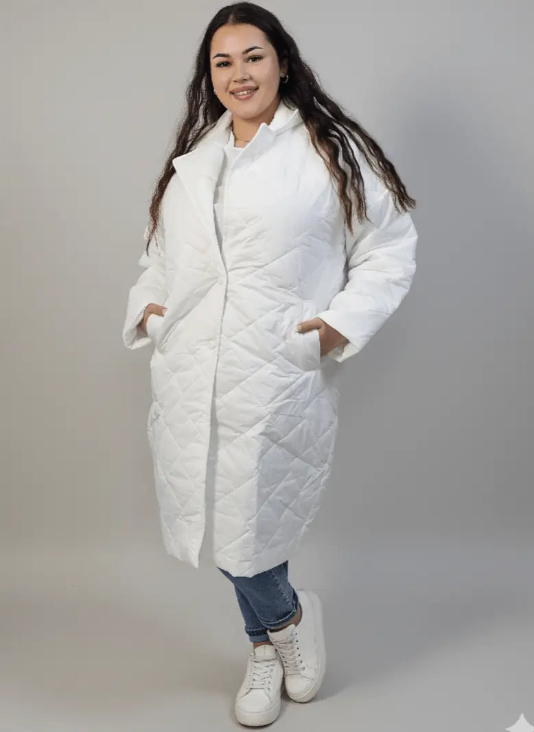 Kurtka plus size pikowana z dłuższym fasonem i kieszeniami Stylowa XL