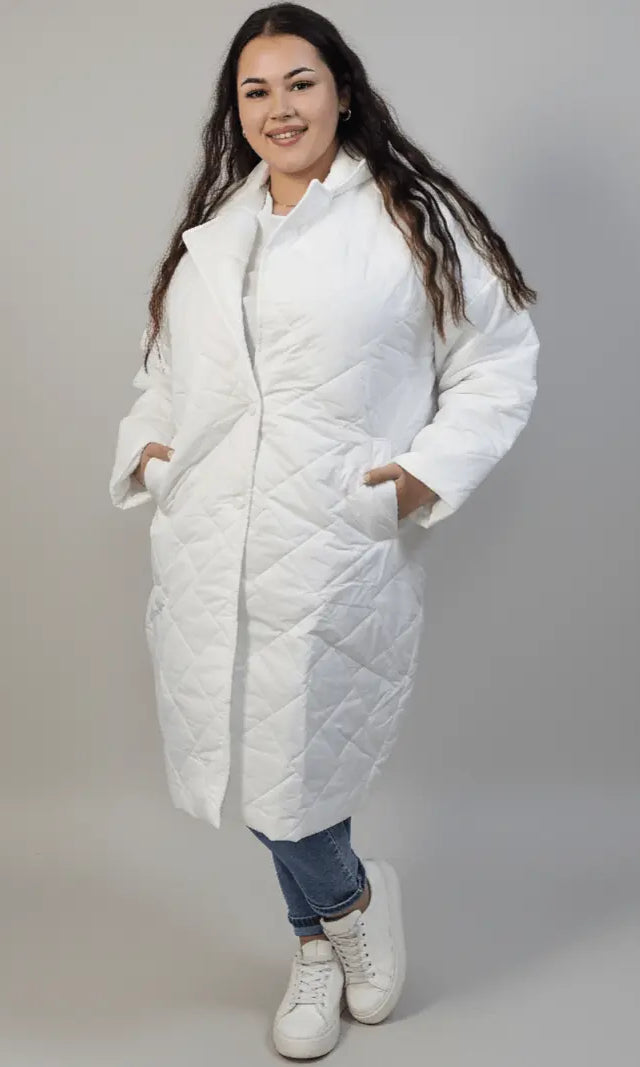 Kurtka plus size pikowana z dłuższym fasonem i kieszeniami Stylowa XL