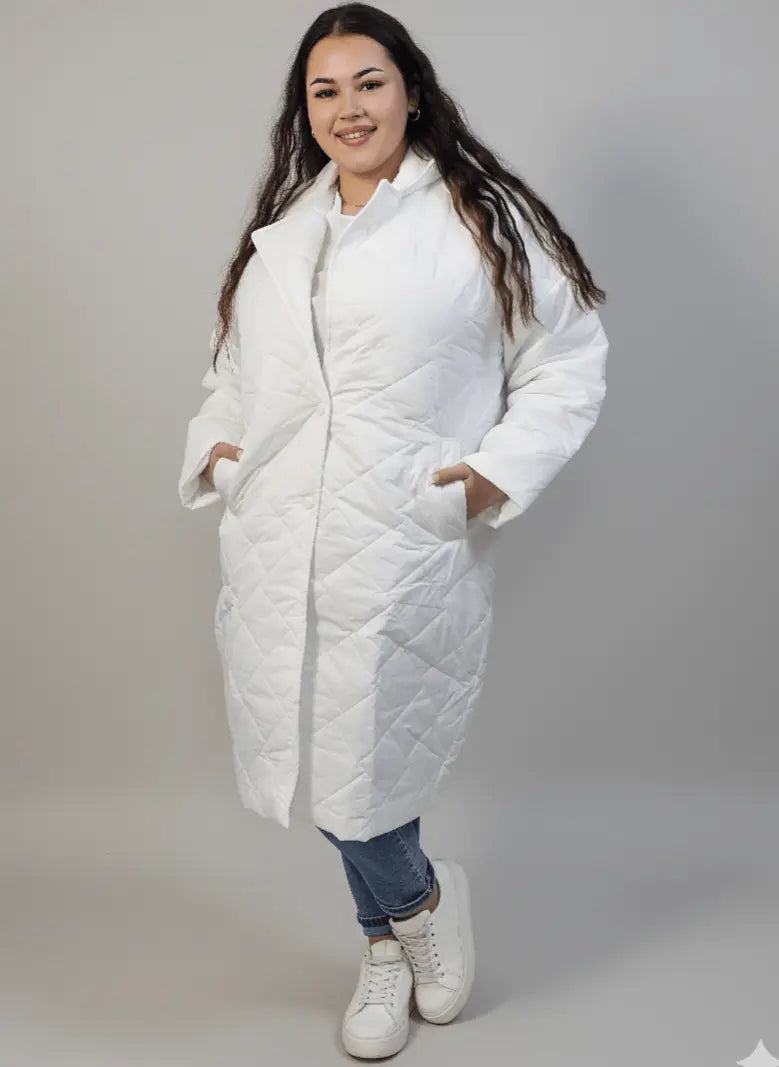 Kurtka plus size pikowana z dłuższym fasonem i kieszeniami Stylowa XL