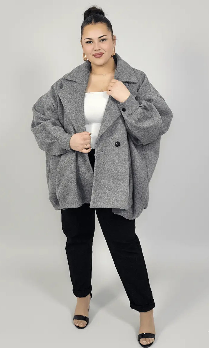 Płaszcz plus size oversize dwurzędowy z szerokim kołnierzem – modny krótki fason XXL Stylowa XL