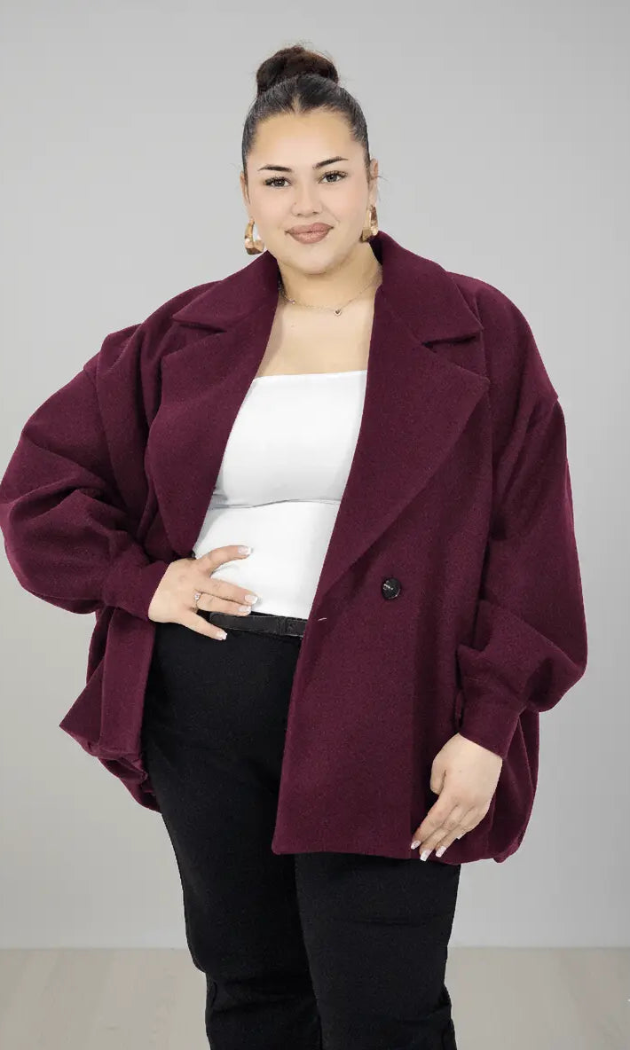 Płaszcz plus size oversize dwurzędowy z szerokim kołnierzem – modny krótki fason XXL Stylowa XL