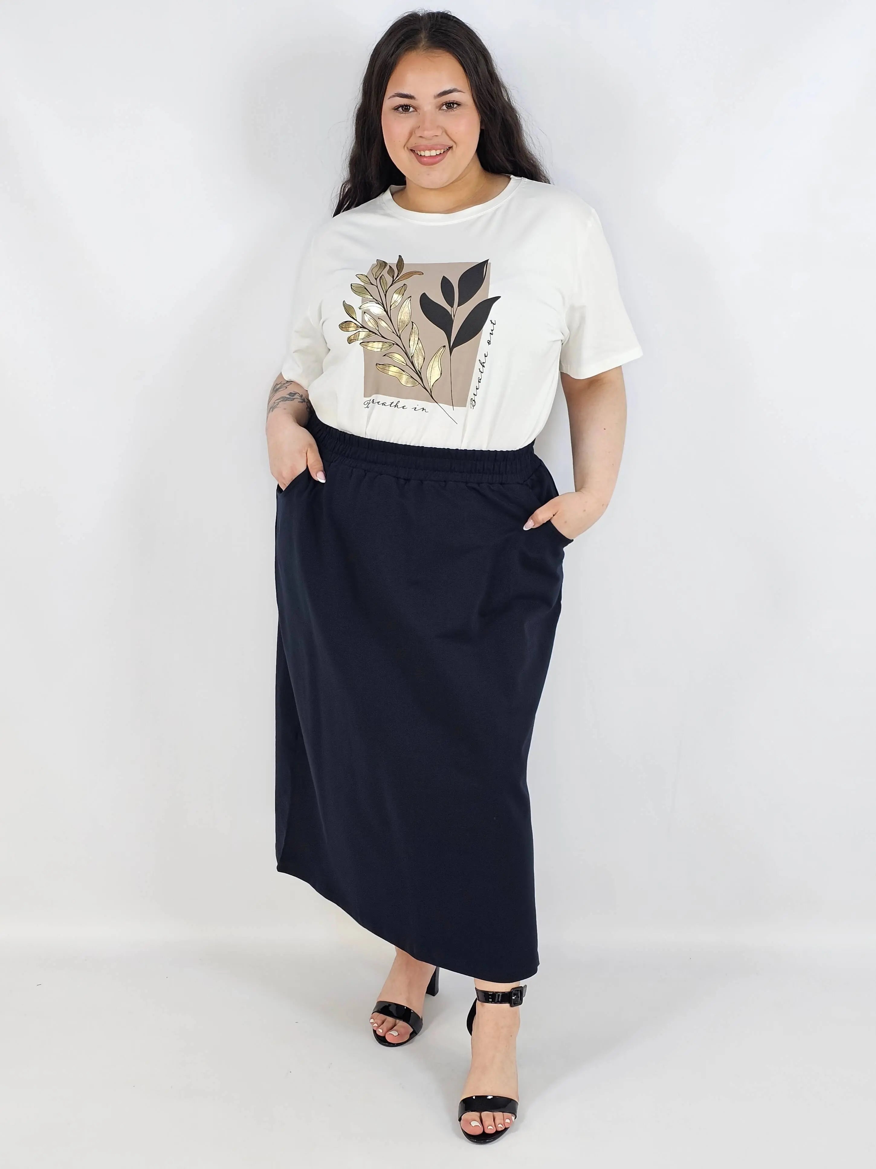 Spódnica midi plus size z kieszeniami – stylowa, wygodna i kobieca Stylowa XL