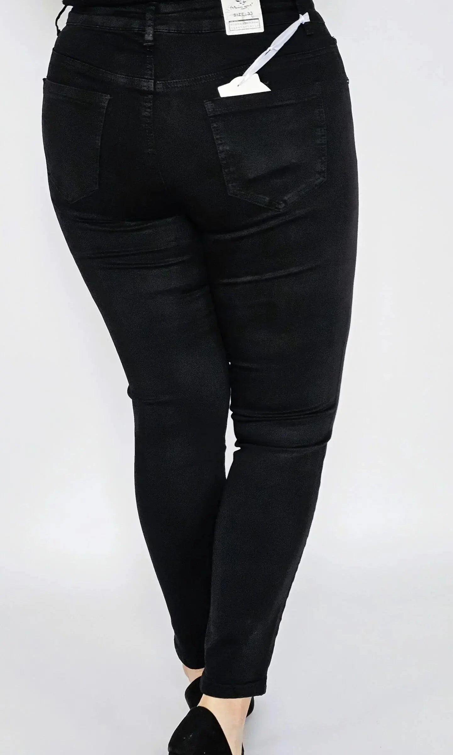 Spodnie czarne z kwiatem z cyrkonii na boku Stylowa XL