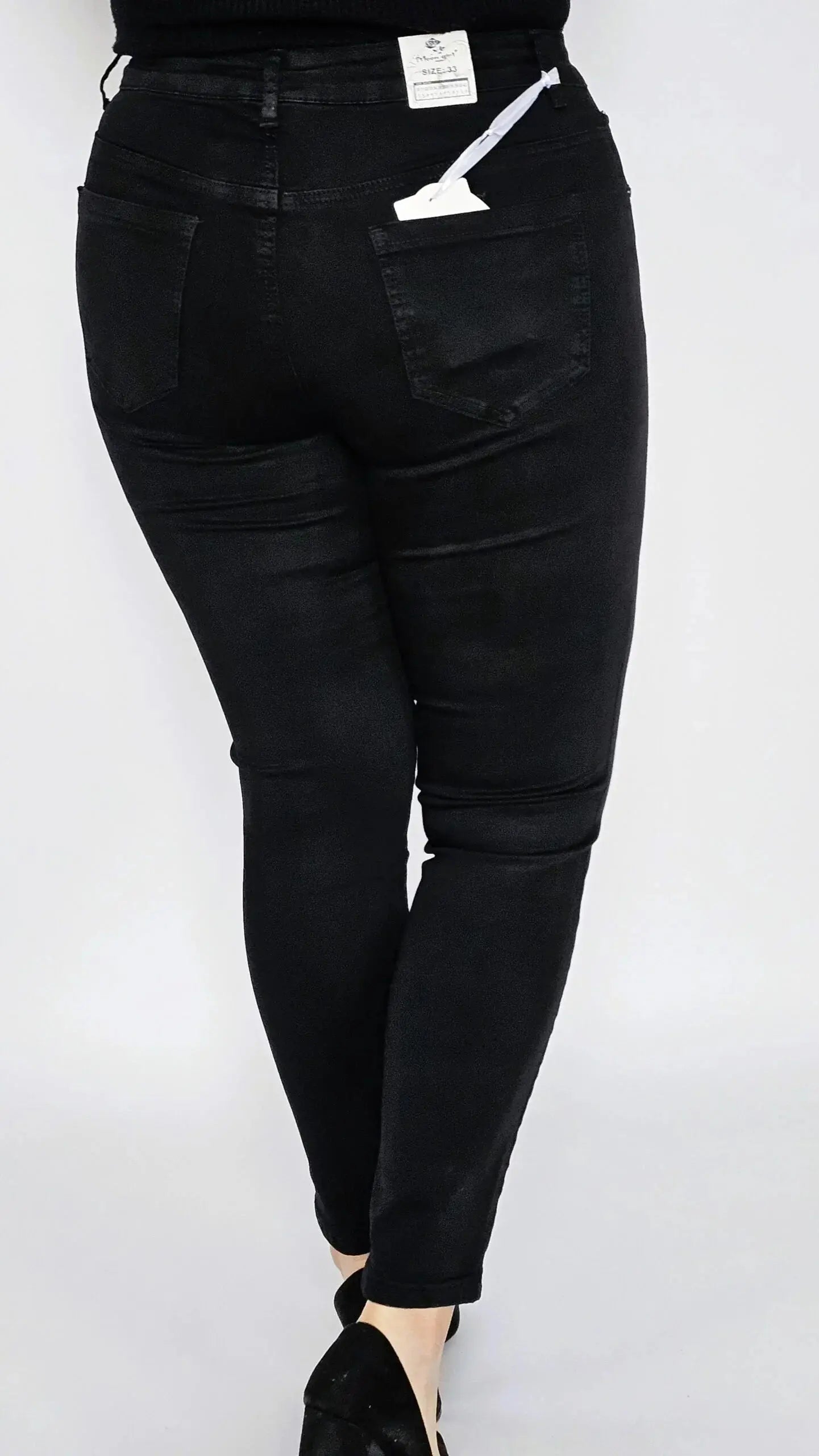 Spodnie czarne z kwiatem z cyrkonii na boku Stylowa XL