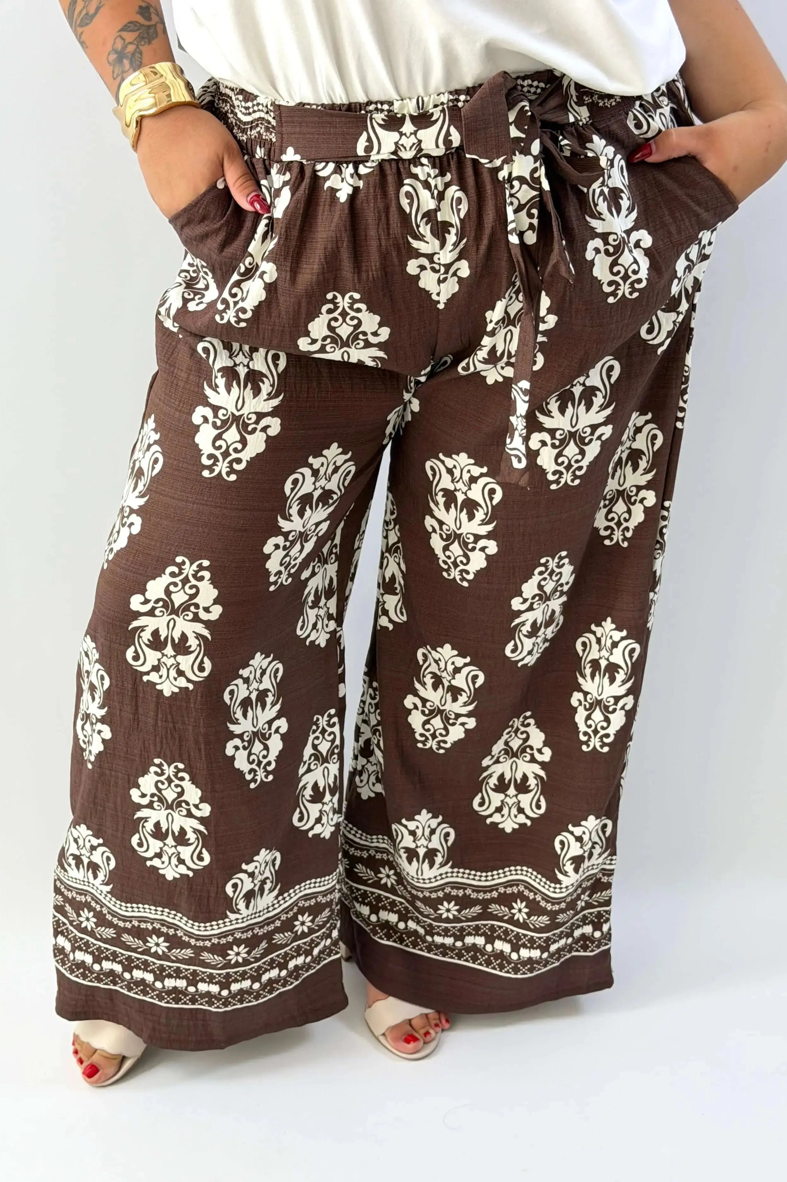 Spodnie damskie plus size z wiązaniem – wygoda i kobiecy styl Stylowa XL