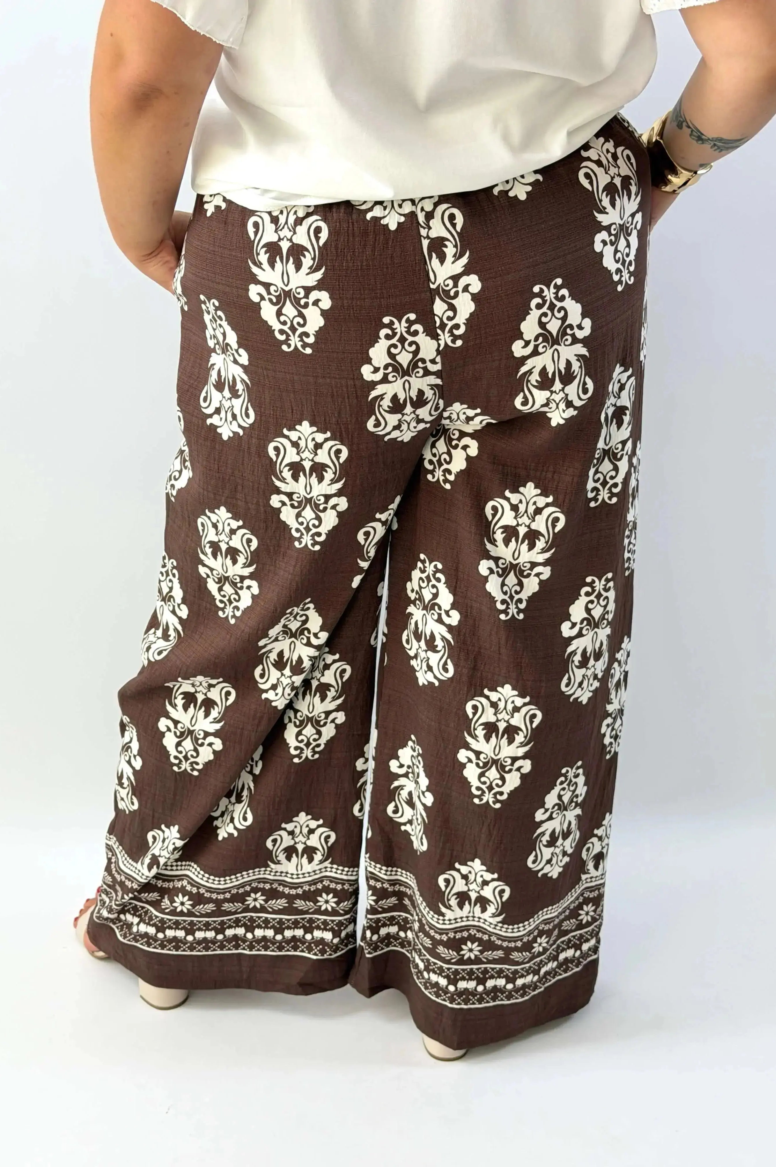 Spodnie damskie plus size z wiązaniem – wygoda i kobiecy styl Stylowa XL