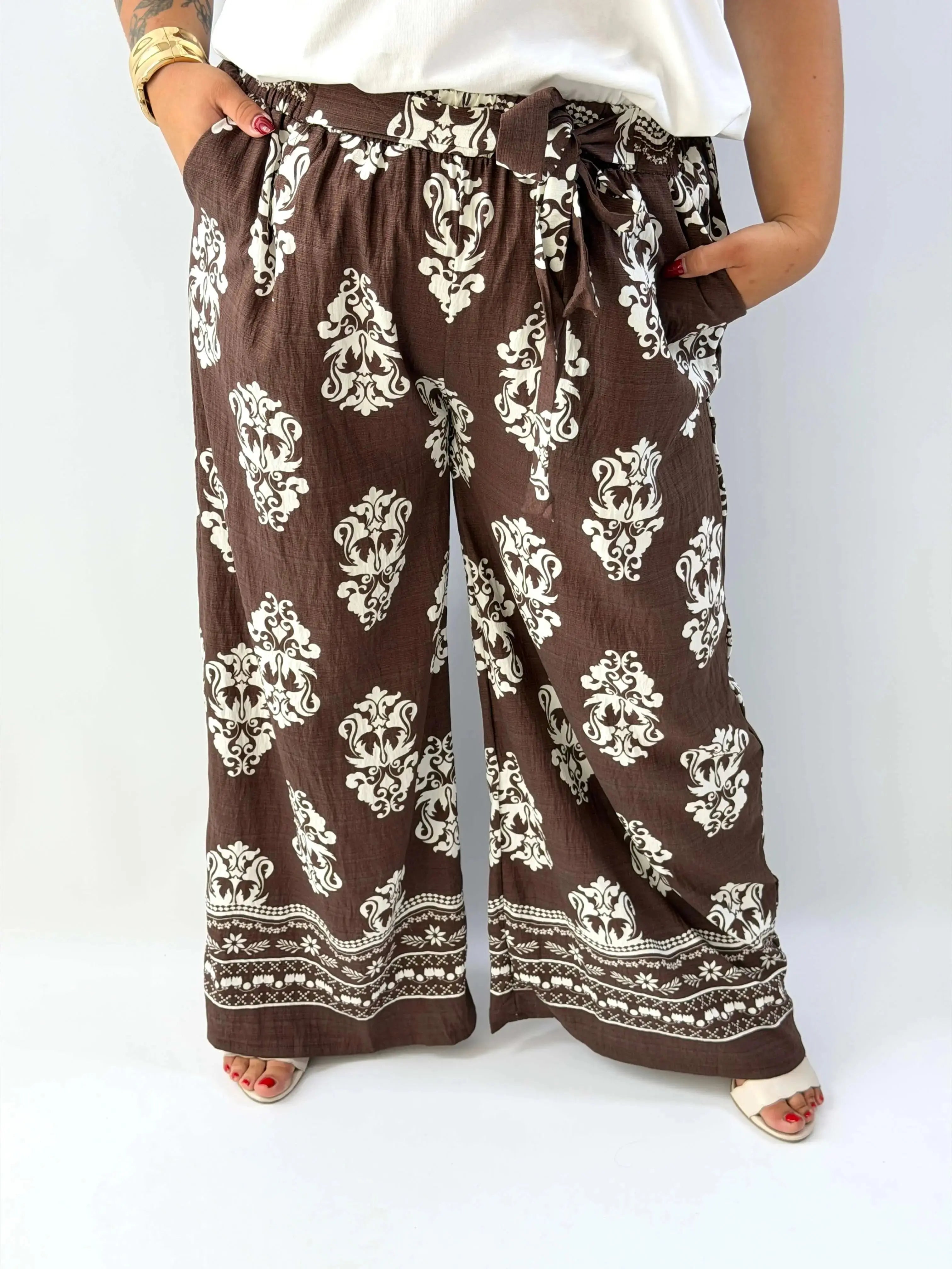 Spodnie damskie plus size z wiązaniem – wygoda i kobiecy styl Stylowa XL