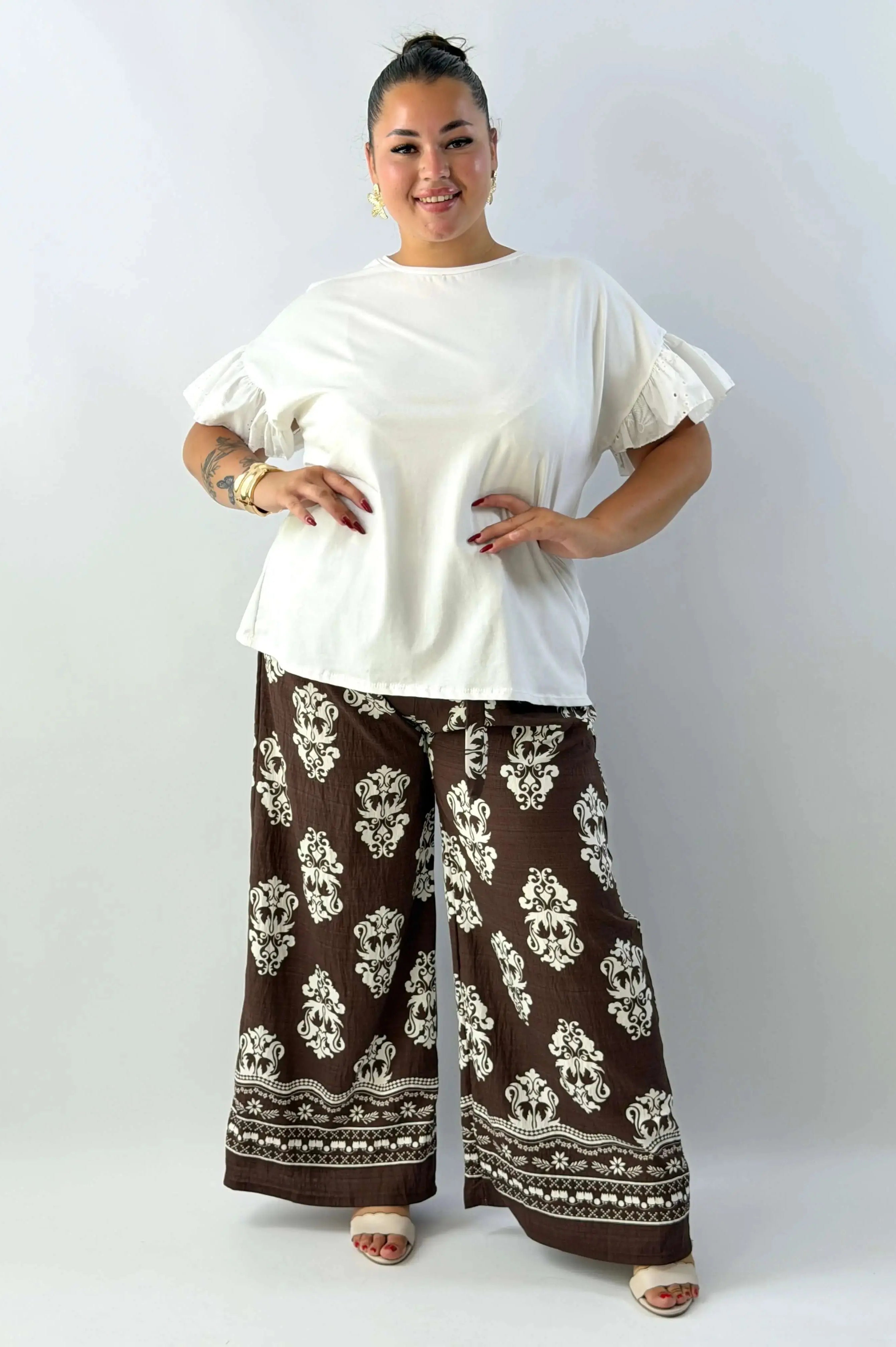 Spodnie damskie plus size z wiązaniem – wygoda i kobiecy styl Stylowa XL