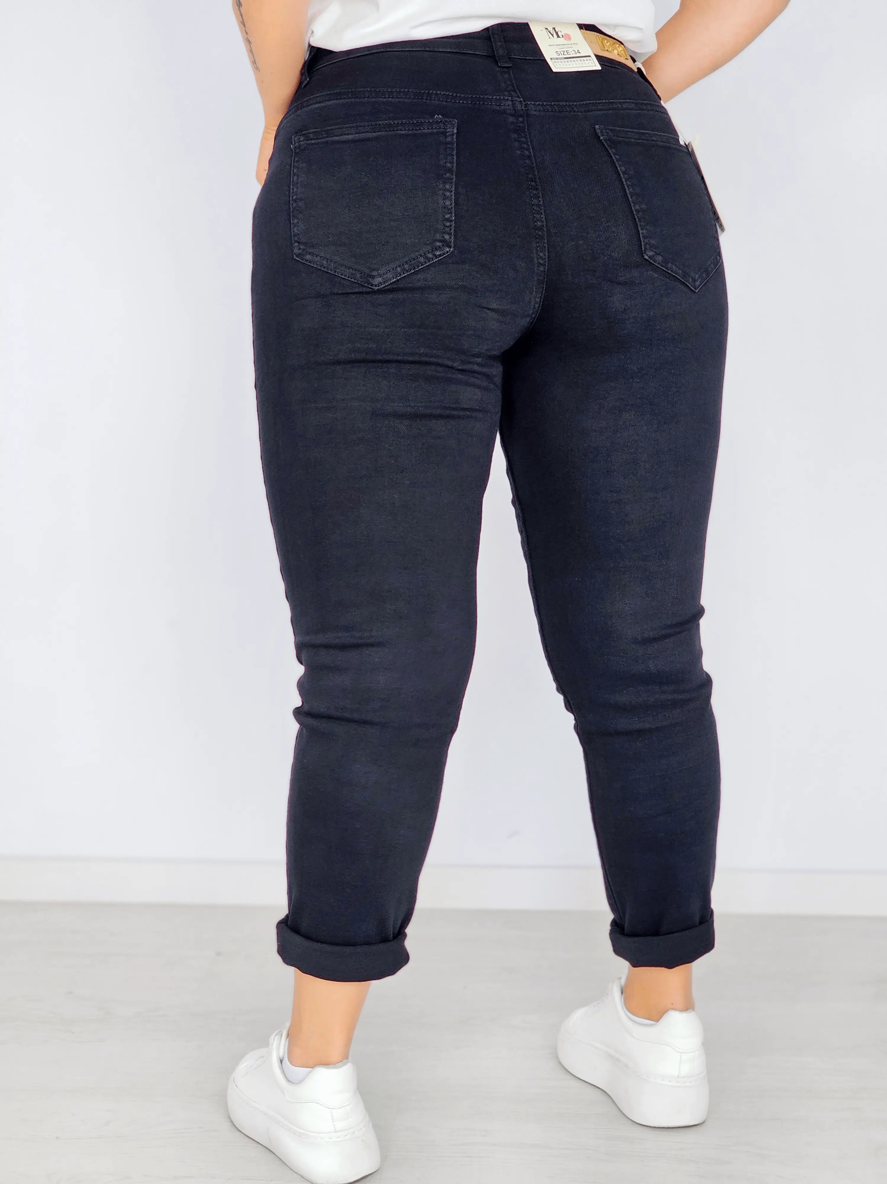 Spodnie mom fit z podwiniętą nogawką Stylowa XL