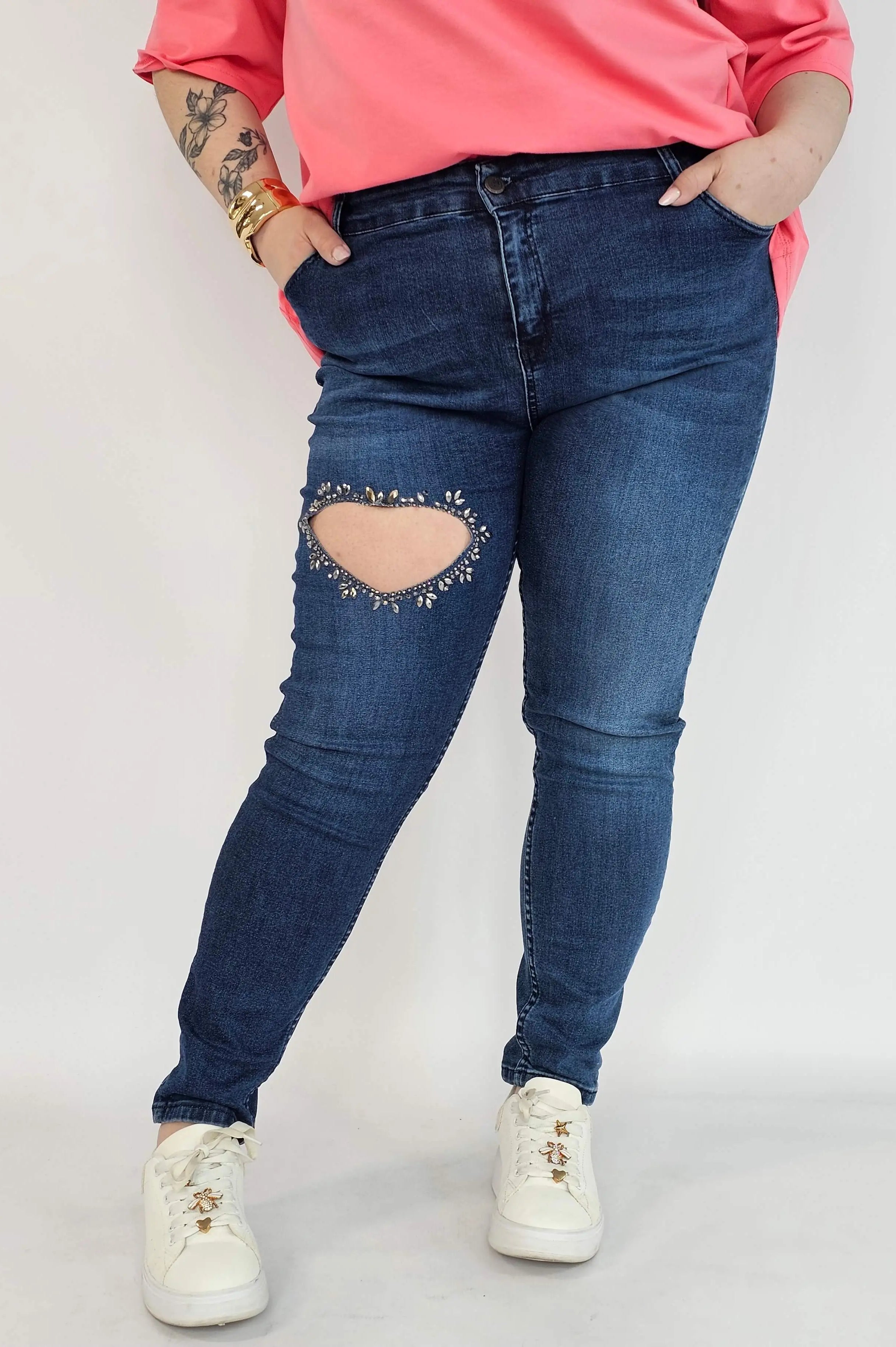 Spodnie plus size jeans – elastyczne jeansy damskie XXL z ozdobnym wycięciem Stylowa XL