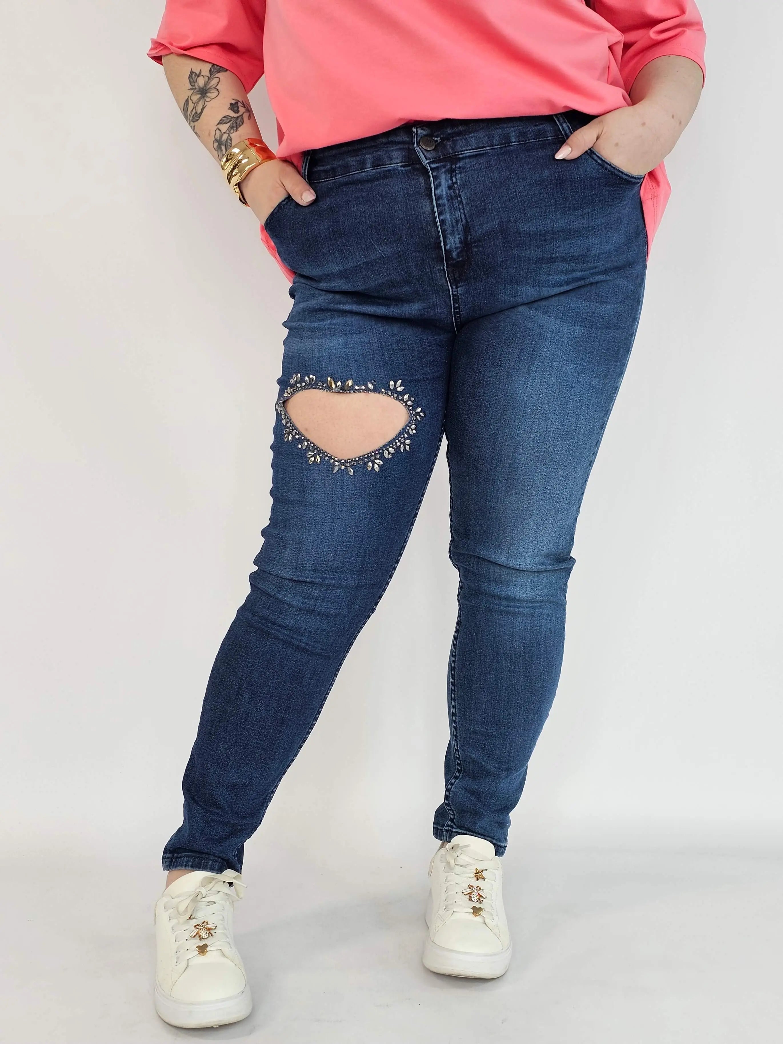 Spodnie plus size jeans – elastyczne jeansy damskie XXL z ozdobnym wycięciem Stylowa XL