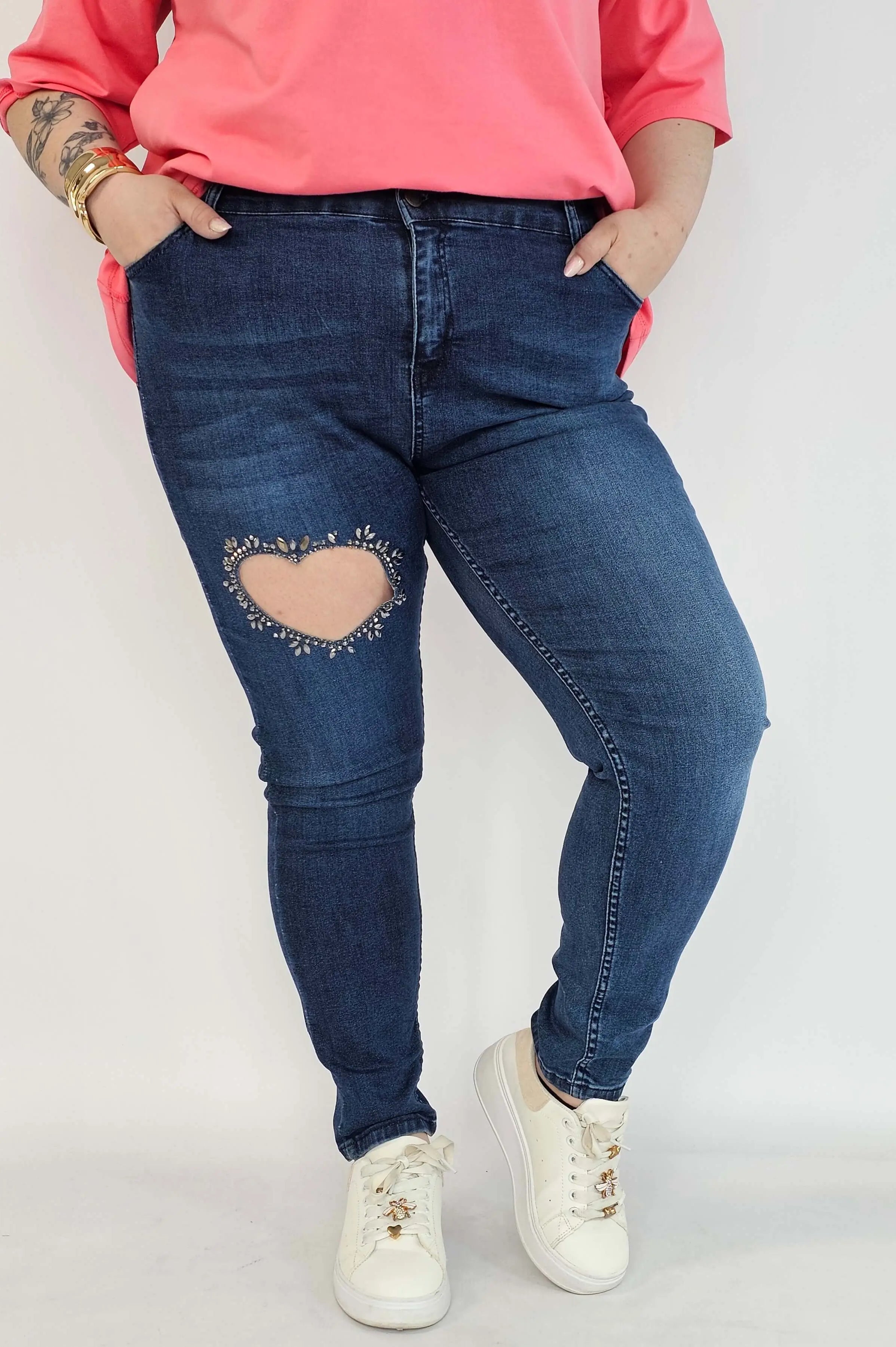 Spodnie plus size jeans – elastyczne jeansy damskie XXL z ozdobnym wycięciem Stylowa XL