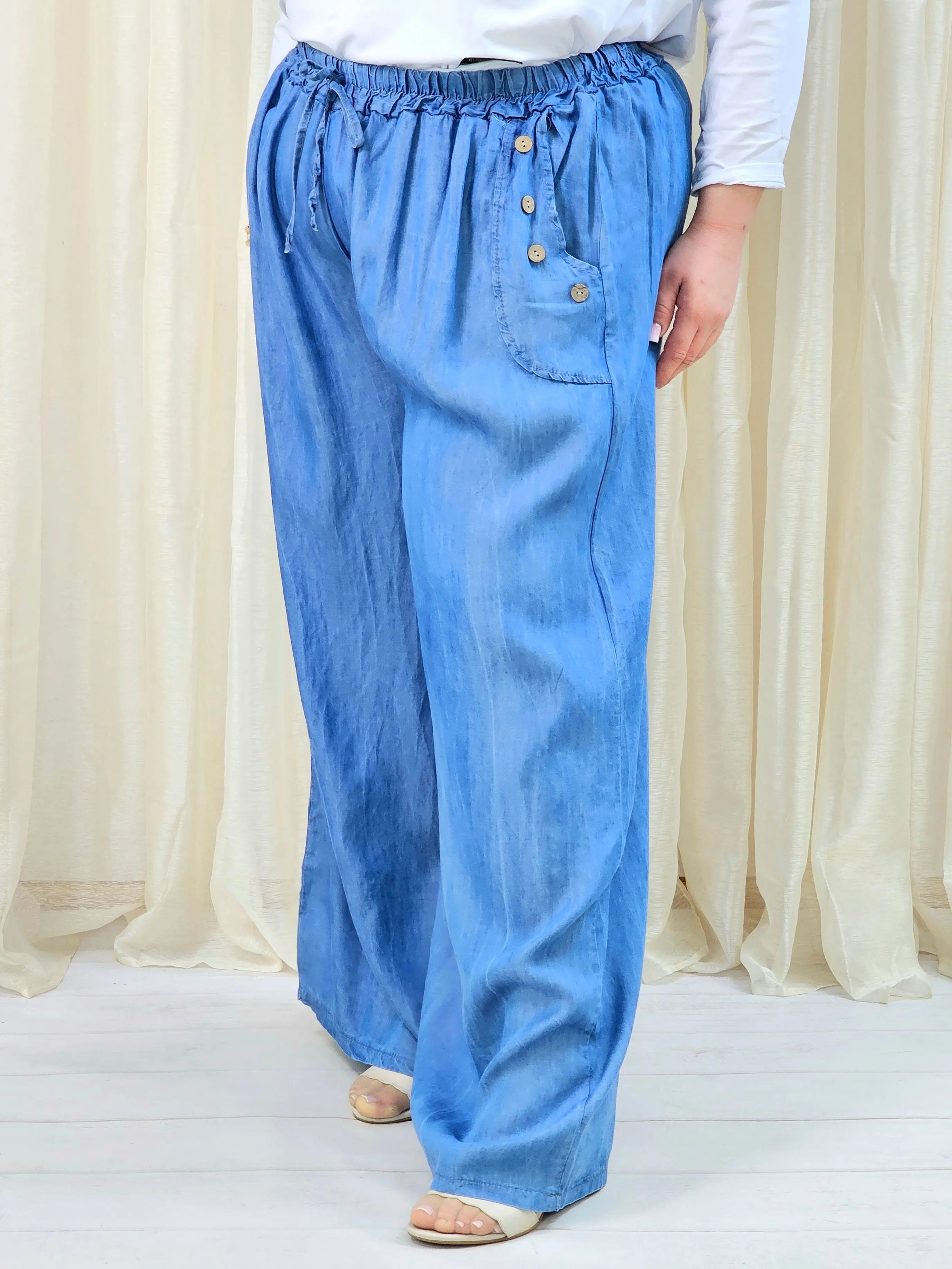 Spodnie plus size szerokie z gumką w pasie – lekkie niebieskie spodnie damskie XXL Stylowa XL