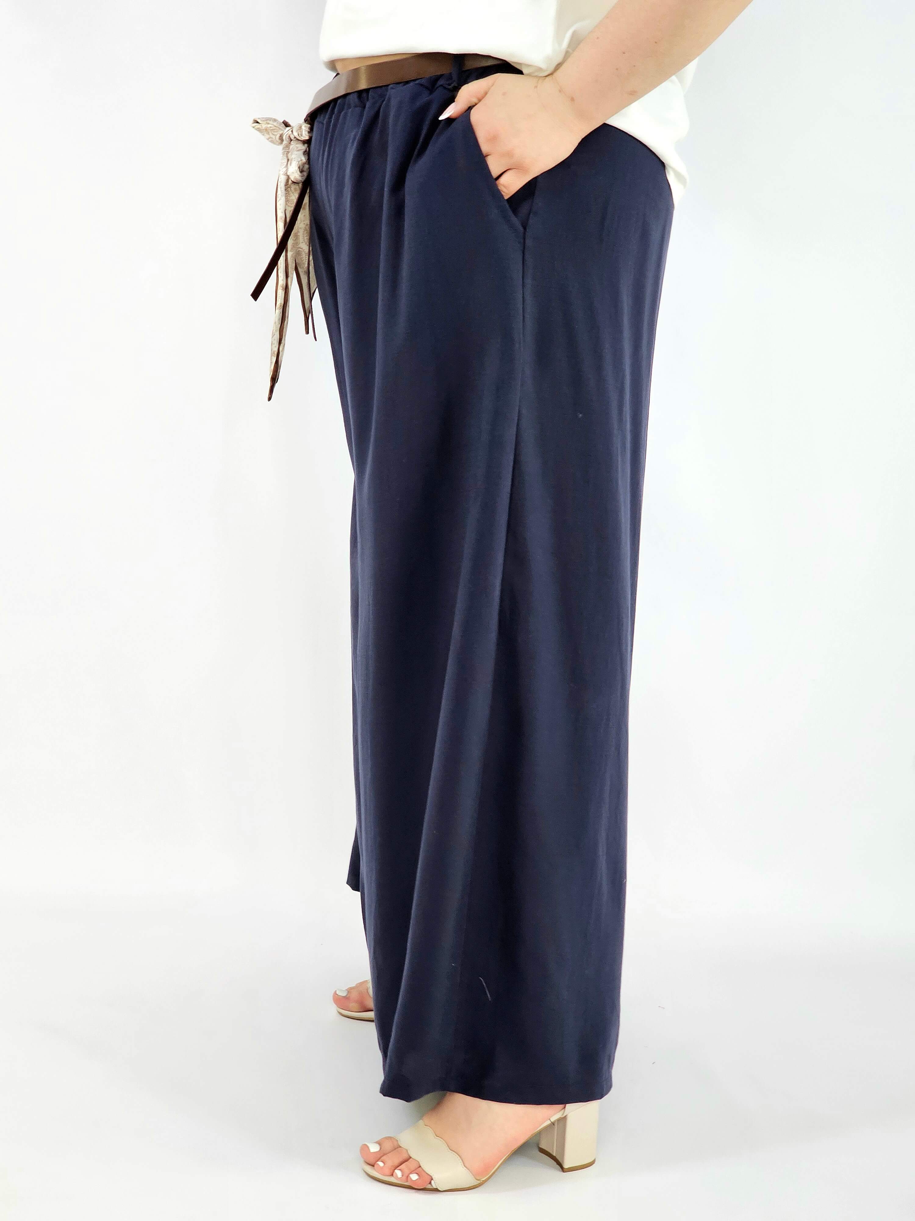 Spodnie plus size szerokie z gumką w pasie i wiązaniem XXL Stylowa XL