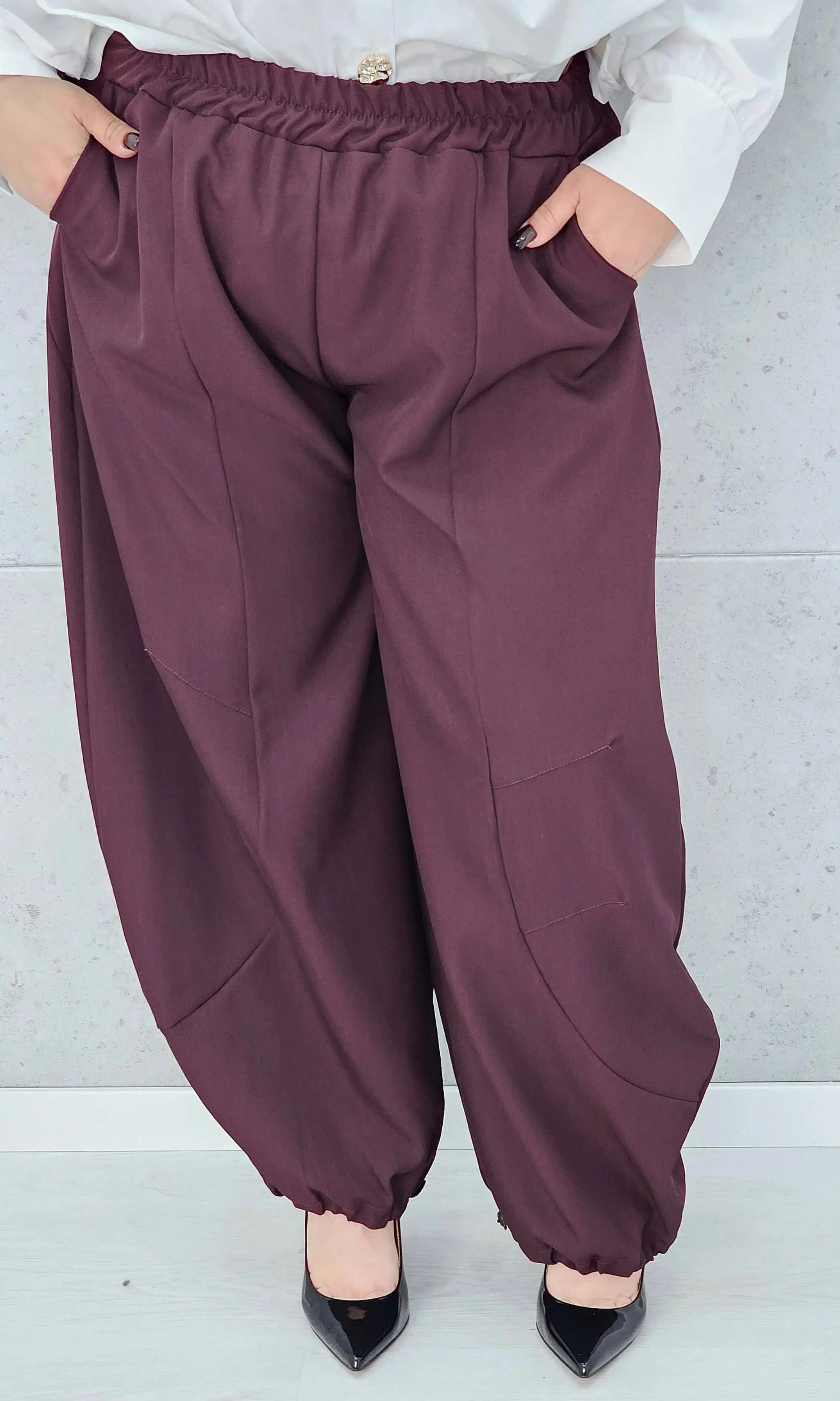 spodnie plus size z kieszeniami i luźnym krojem przodem