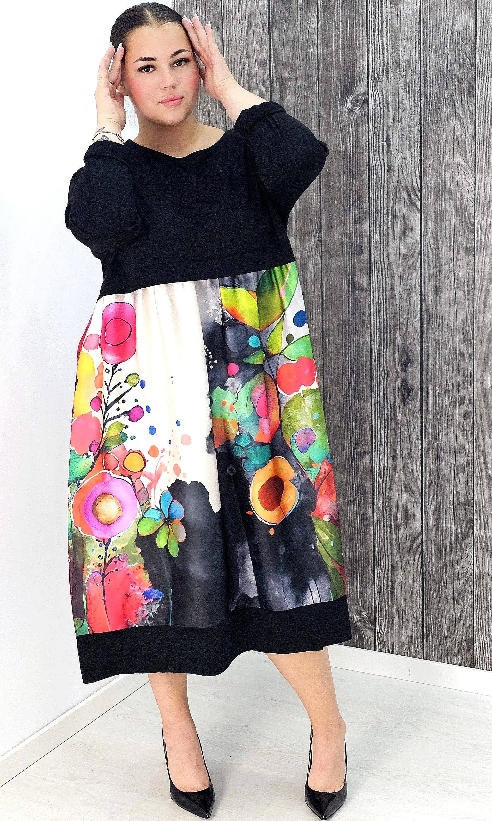 Sukienka midi plus size – elegancka długość i kobiecy krój dla każdej sylwetki Stylowa XL