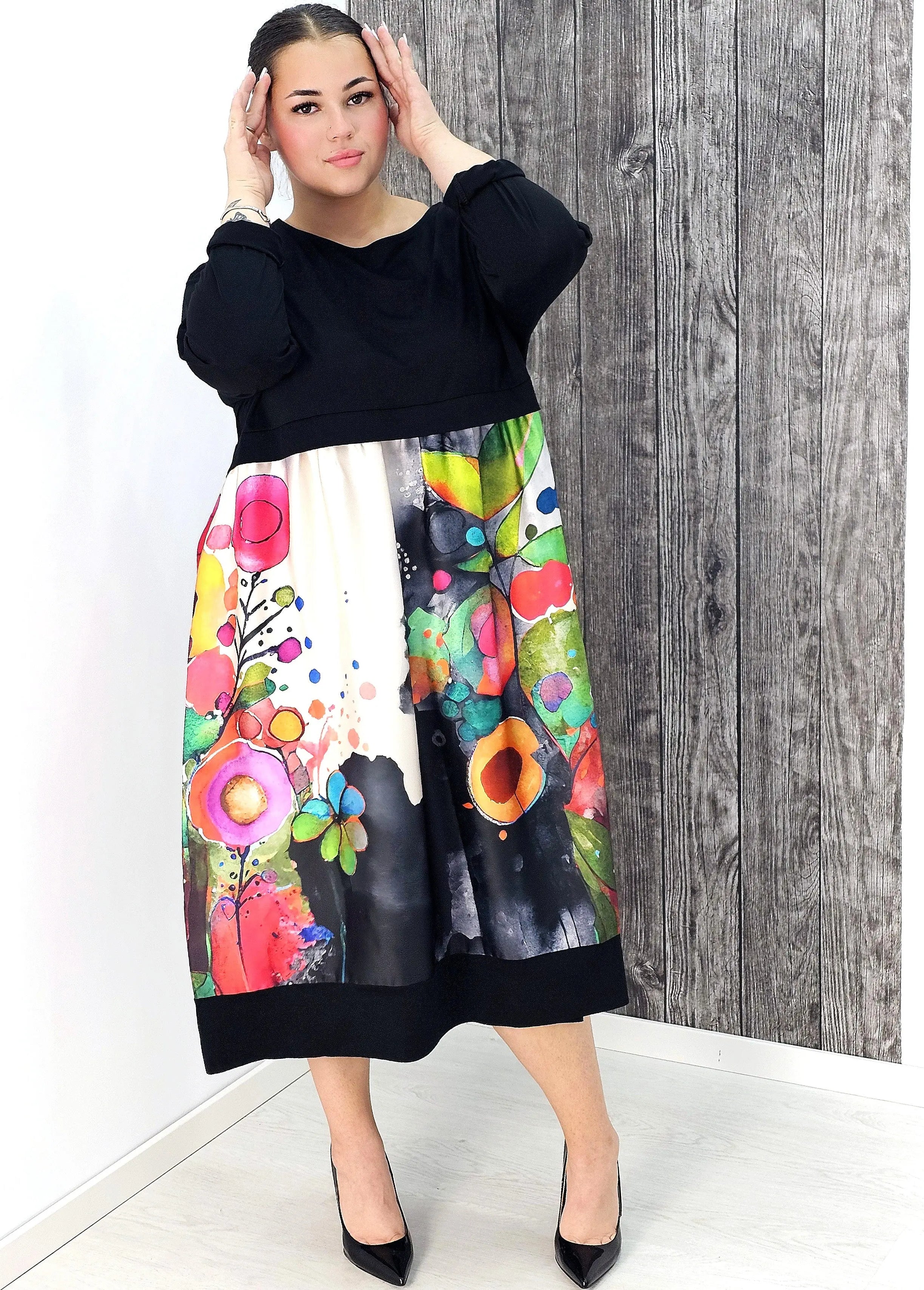 Sukienka midi plus size – elegancka długość i kobiecy krój dla każdej sylwetki Stylowa XL