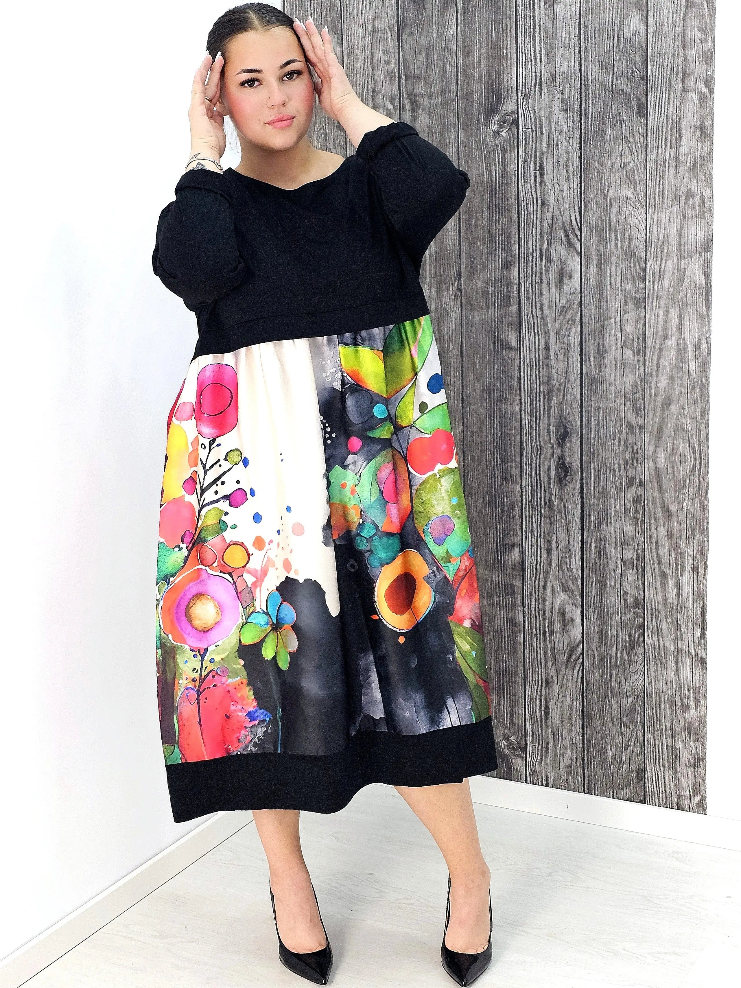 Sukienka midi plus size – elegancka długość i kobiecy krój dla każdej sylwetki Stylowa XL