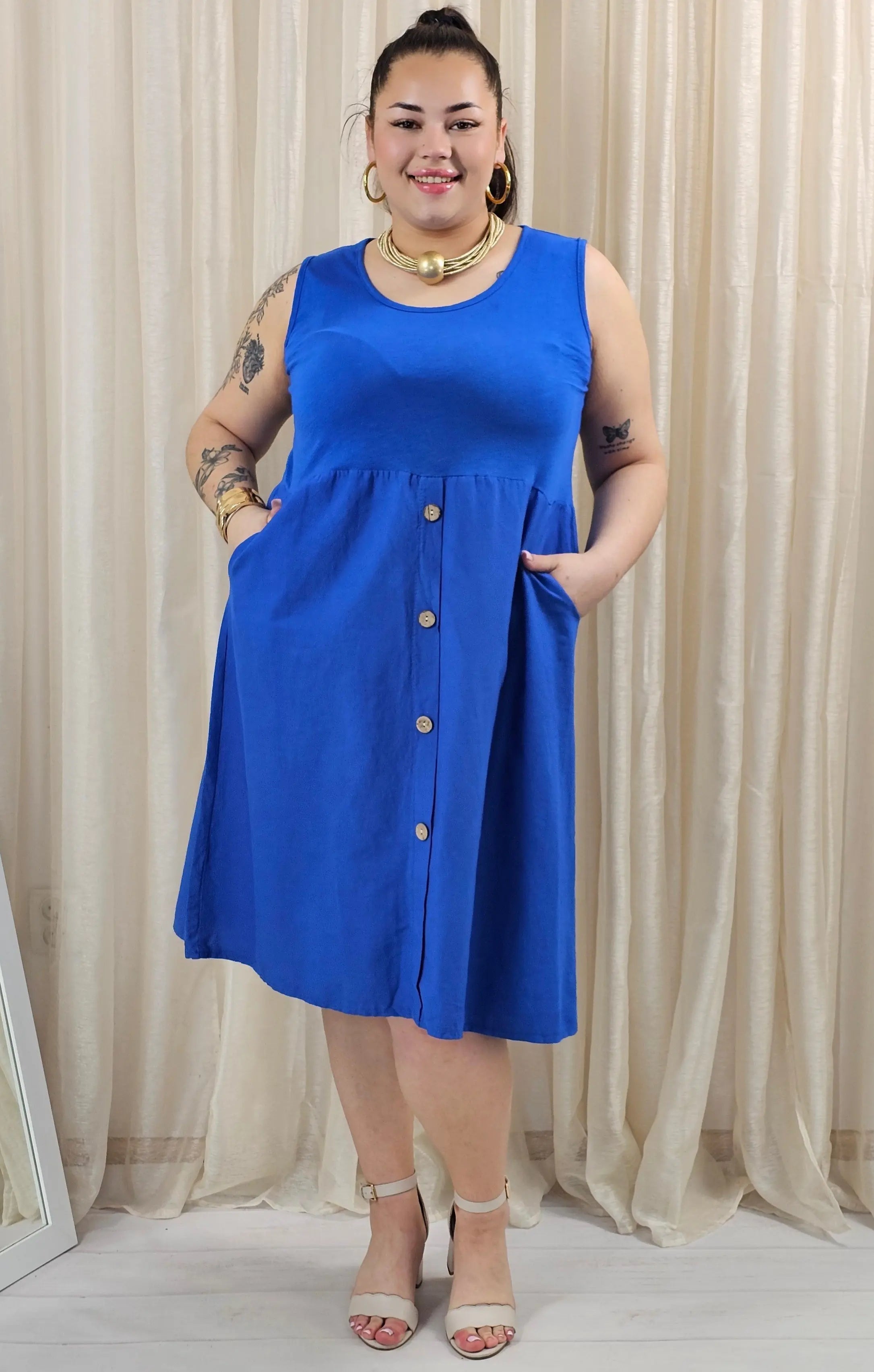 Sukienka odcinana pod biustem dołem ozdobne guziczki w kilku kolorach Stylowa XL