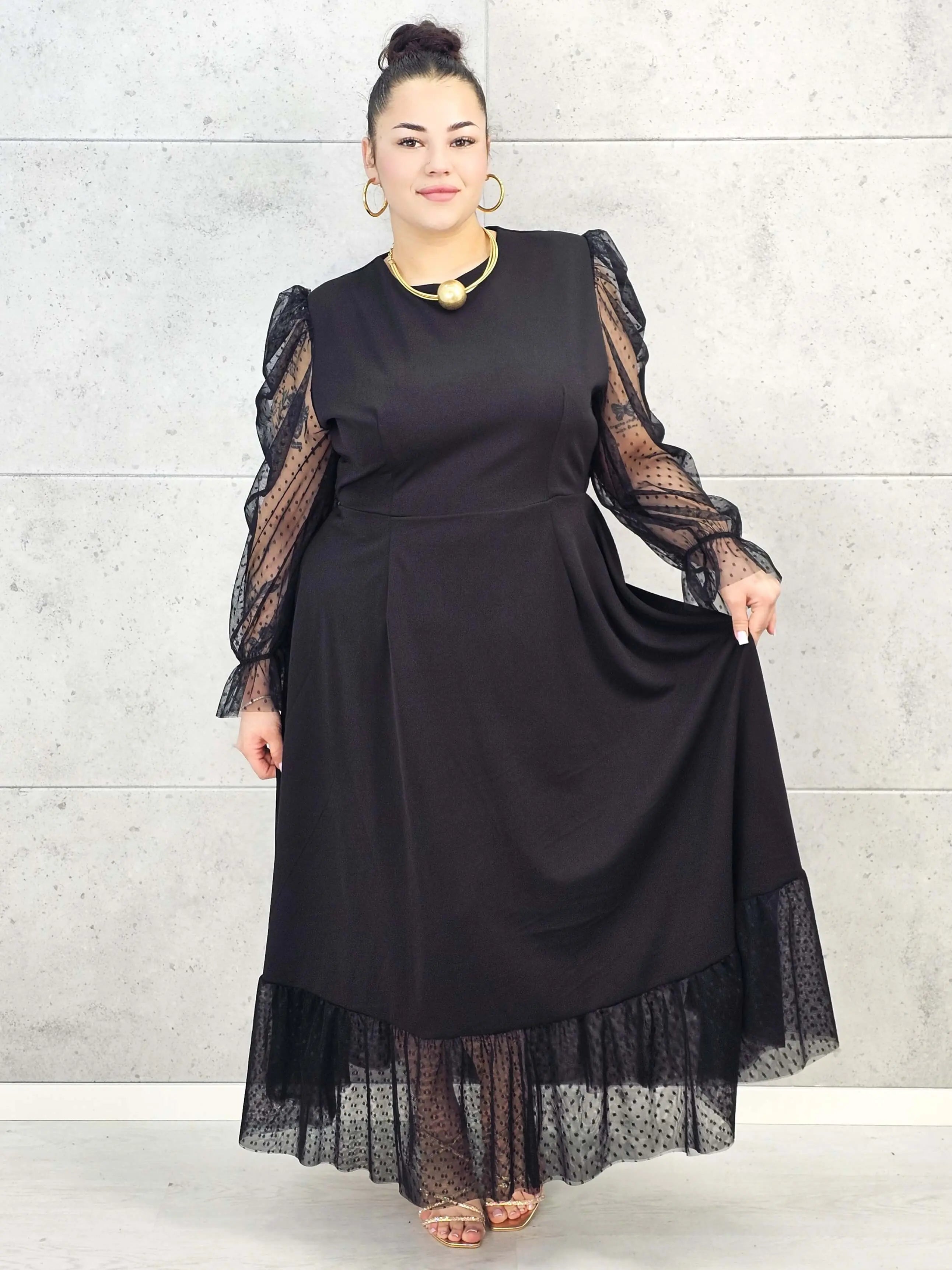 Sukienka plus size czarna maxi z transparentnymi rękawami – elegancja i lekkość Stylowa XL