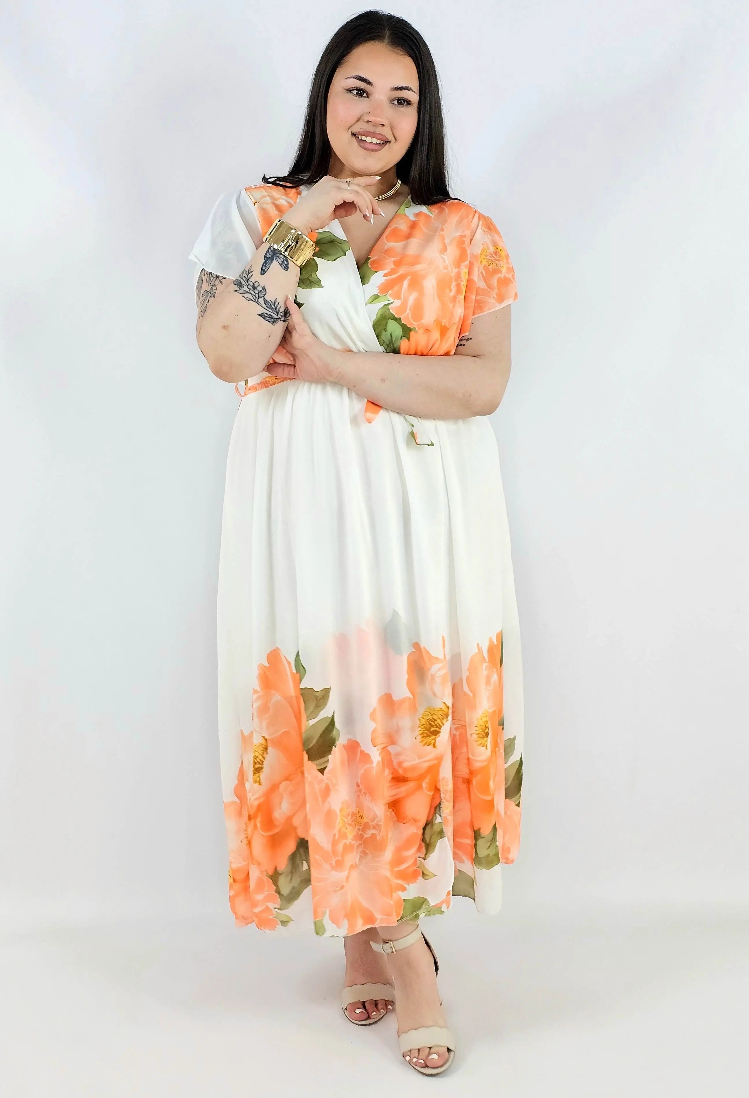Sukienka plus size kopertowa XXL – elegancka i zwiewna propozycja na komunię i wesele Stylowa XL