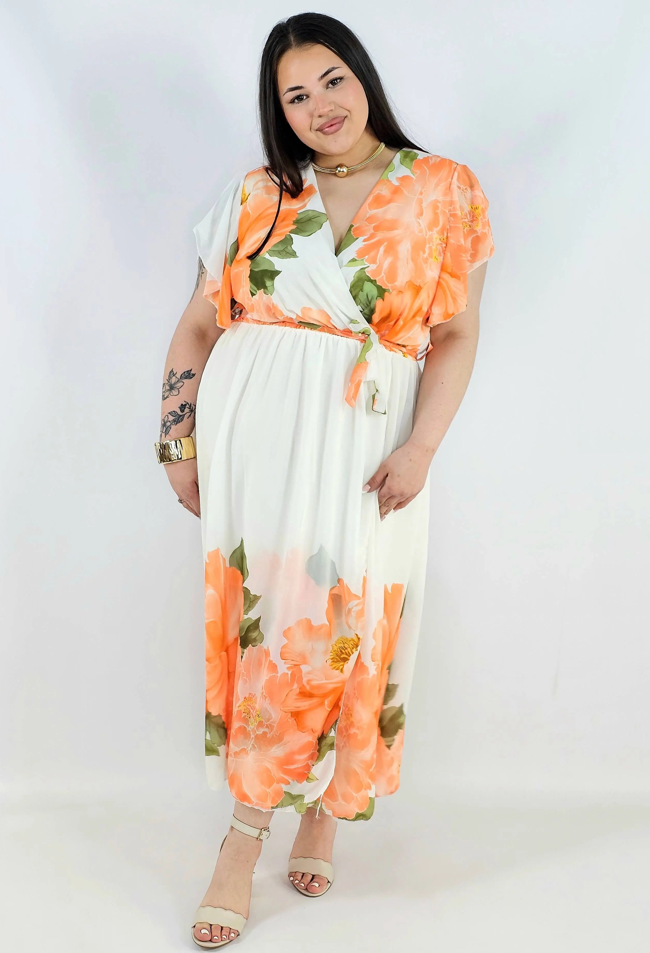 Sukienka plus size kopertowa XXL – elegancka i zwiewna propozycja na komunię i wesele Stylowa XL