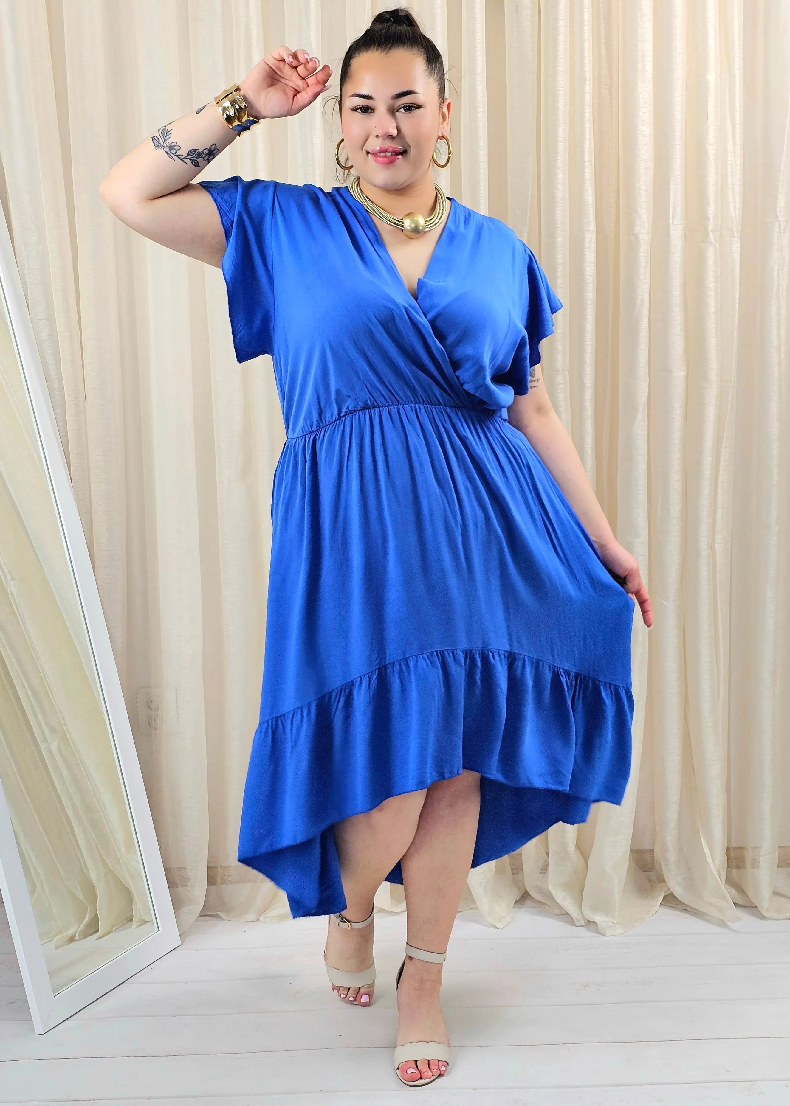 Sukienka plus size z kopertowym dekoltem – asymetryczna sukienka damska XXL Stylowa XL