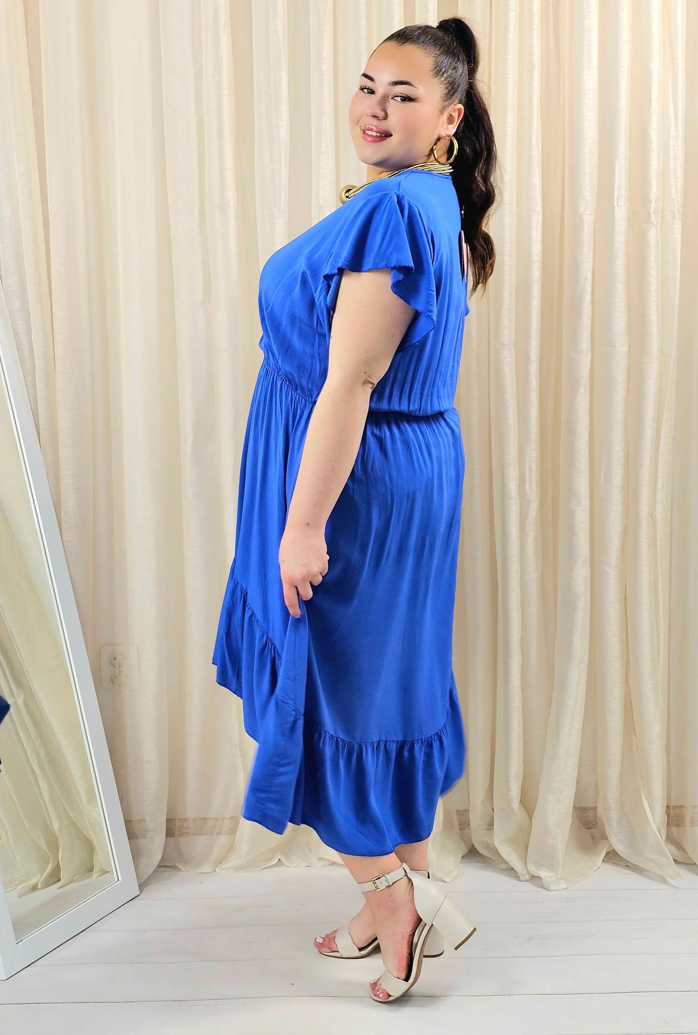 Sukienka plus size z kopertowym dekoltem – asymetryczna sukienka damska XXL Stylowa XL