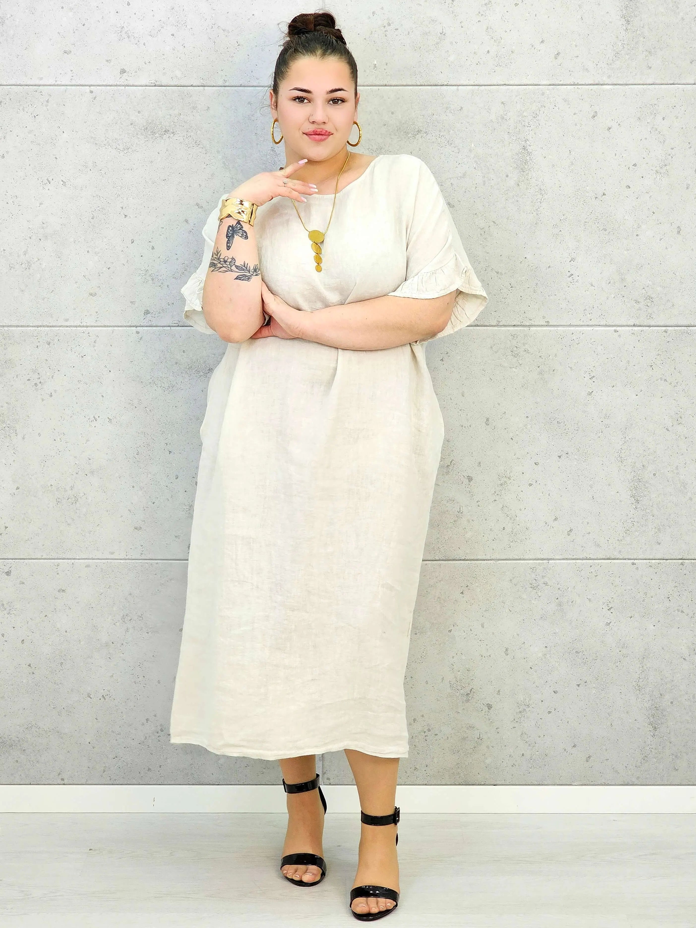 Sukienka plus size z luźnym fasonem i efektownym wiązaniem na plecach Stylowa XL