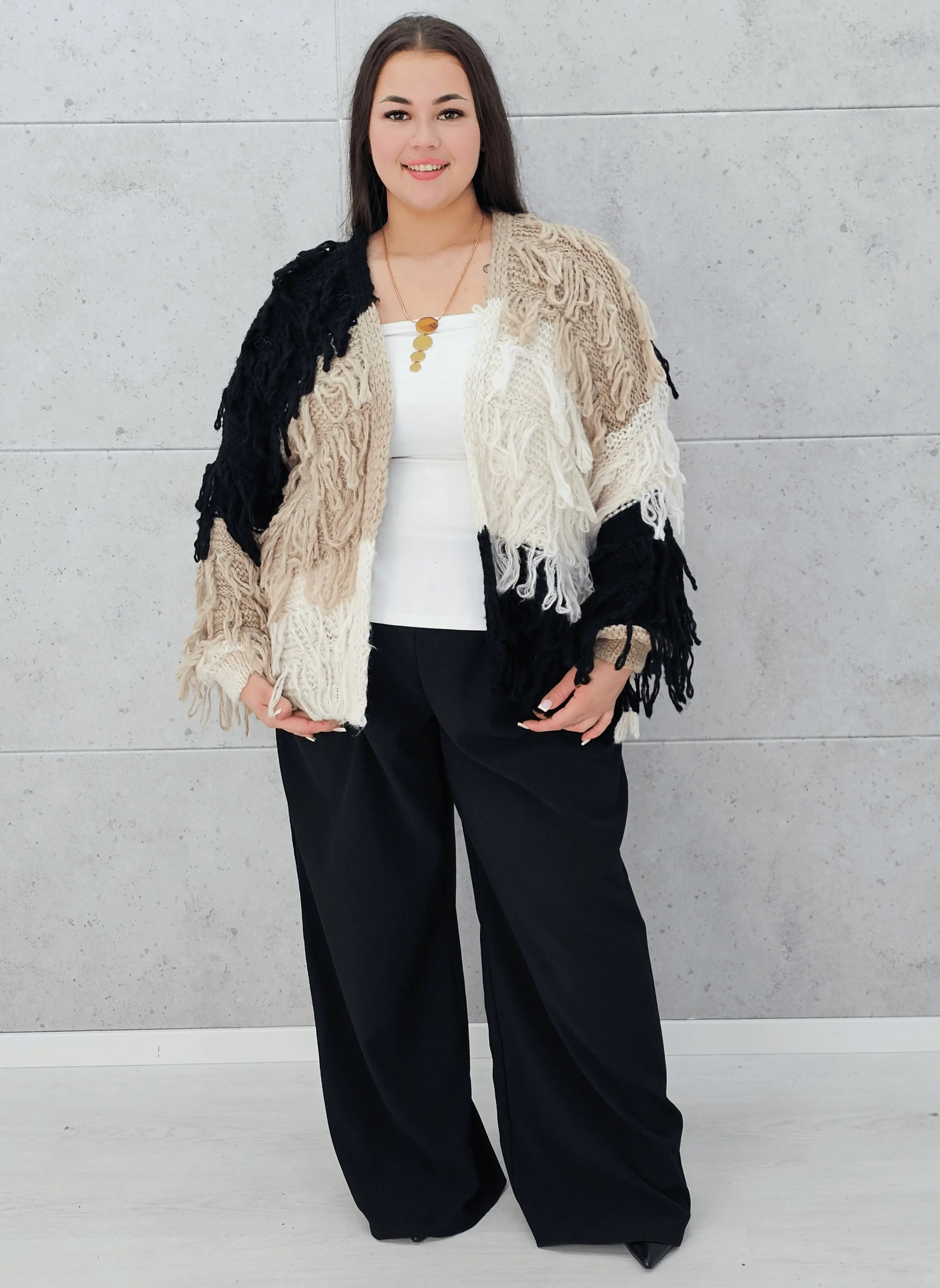 Sweter plus size – ciepły, stylowy i idealnie dopasowany do kobiecej sylwetki Stylowa XL