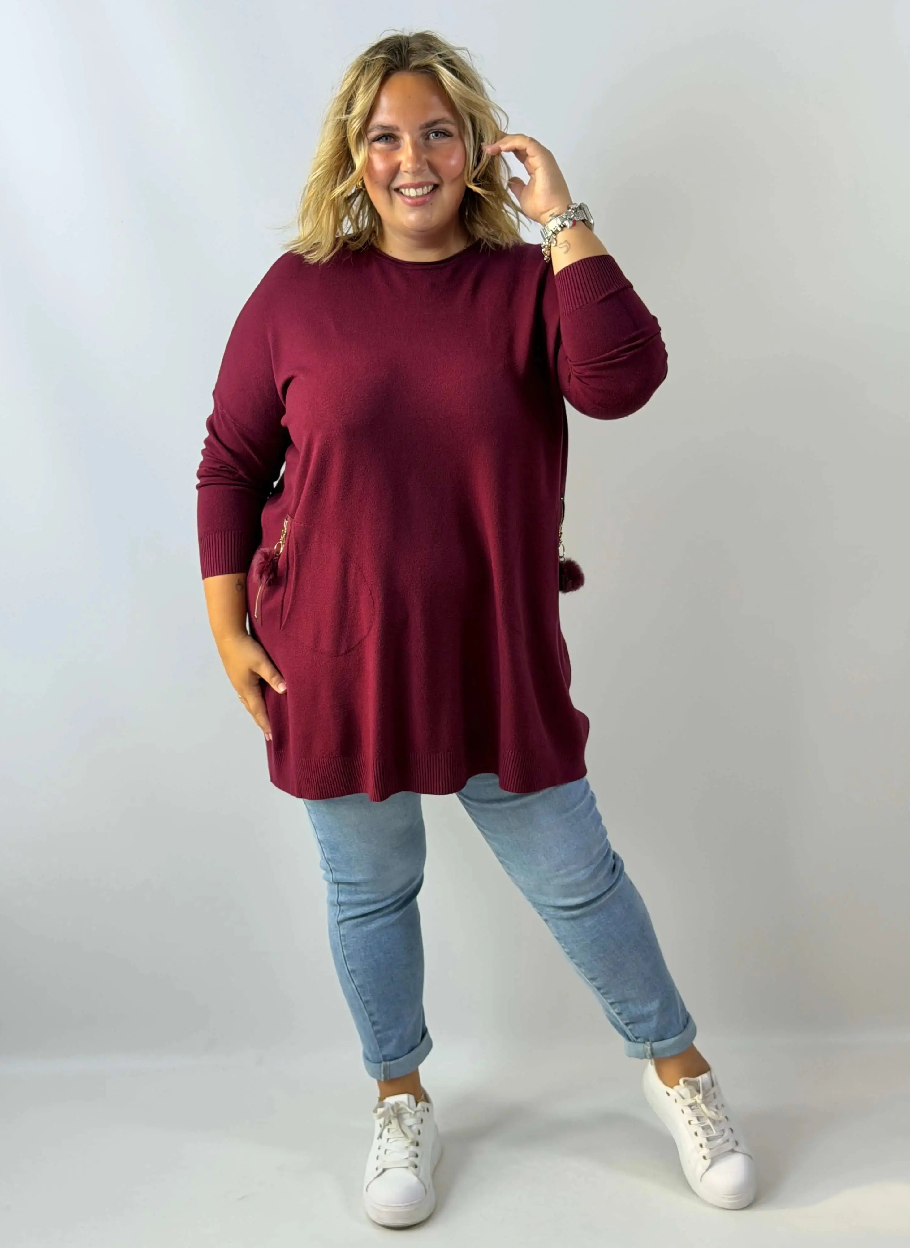 Tunika sweterkowa Plus Size z kieszeniami i ozdobnym pomponem Stylowa XL