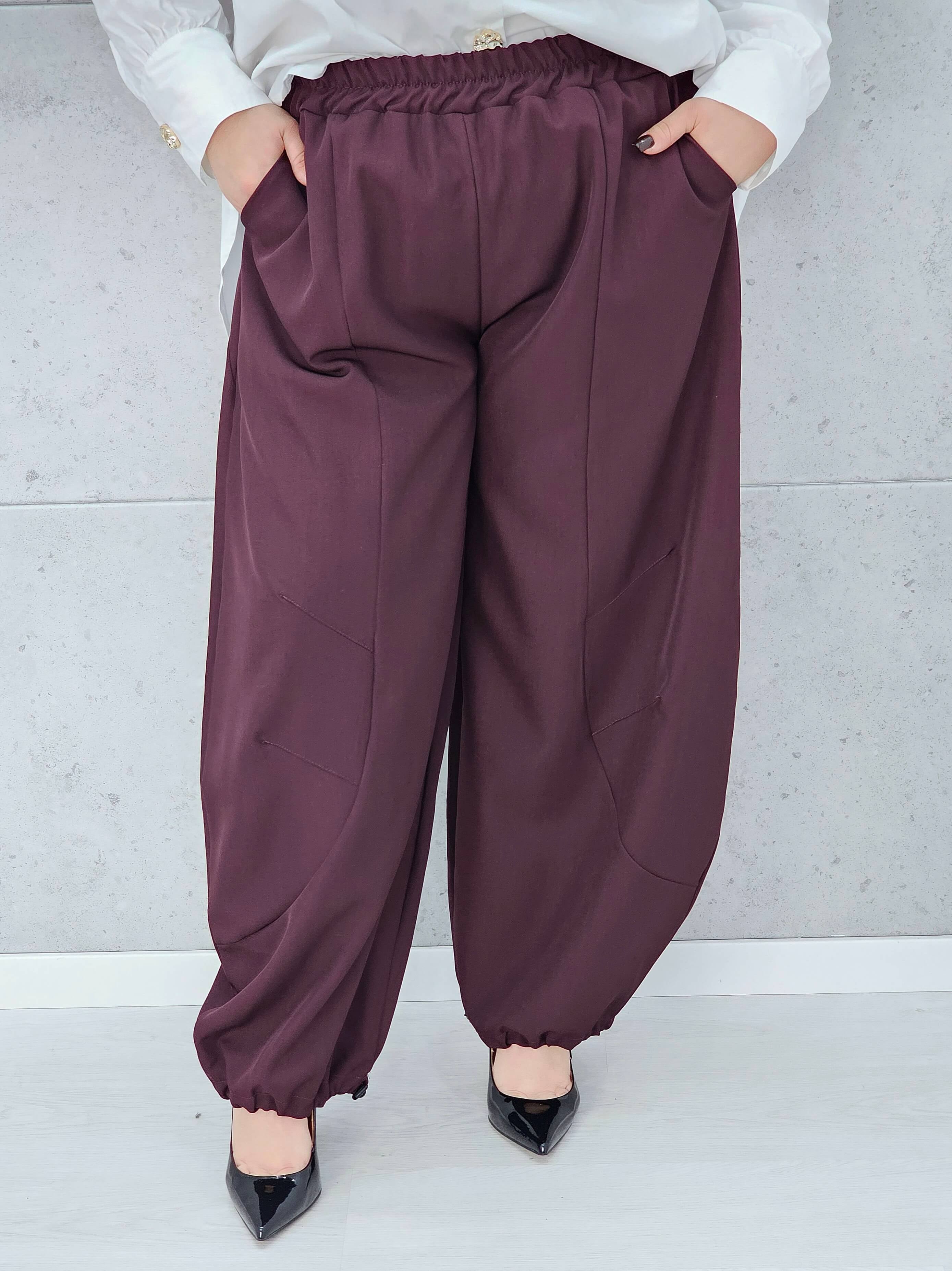 spodnie plus size z kieszeniami i luźnym krojem całość