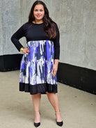 Sukienka midi z kontrastowym printem Stylowa XL