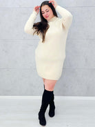 Sukienka sweterkowa z ozdobnymi guzikami na ramieniu z jednej strony Stylowa XL