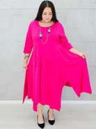 Asymetryczna sukienka z miękkiej dzianiny– moda dla kobiet plus size Stylowa XL