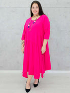 Asymetryczna sukienka z miękkiej dzianiny– moda dla kobiet plus size Stylowa XL