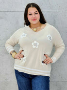 Beżowa bluzka plus size z kwiatami – subtelna elegancja i wygoda. Stylowa XL