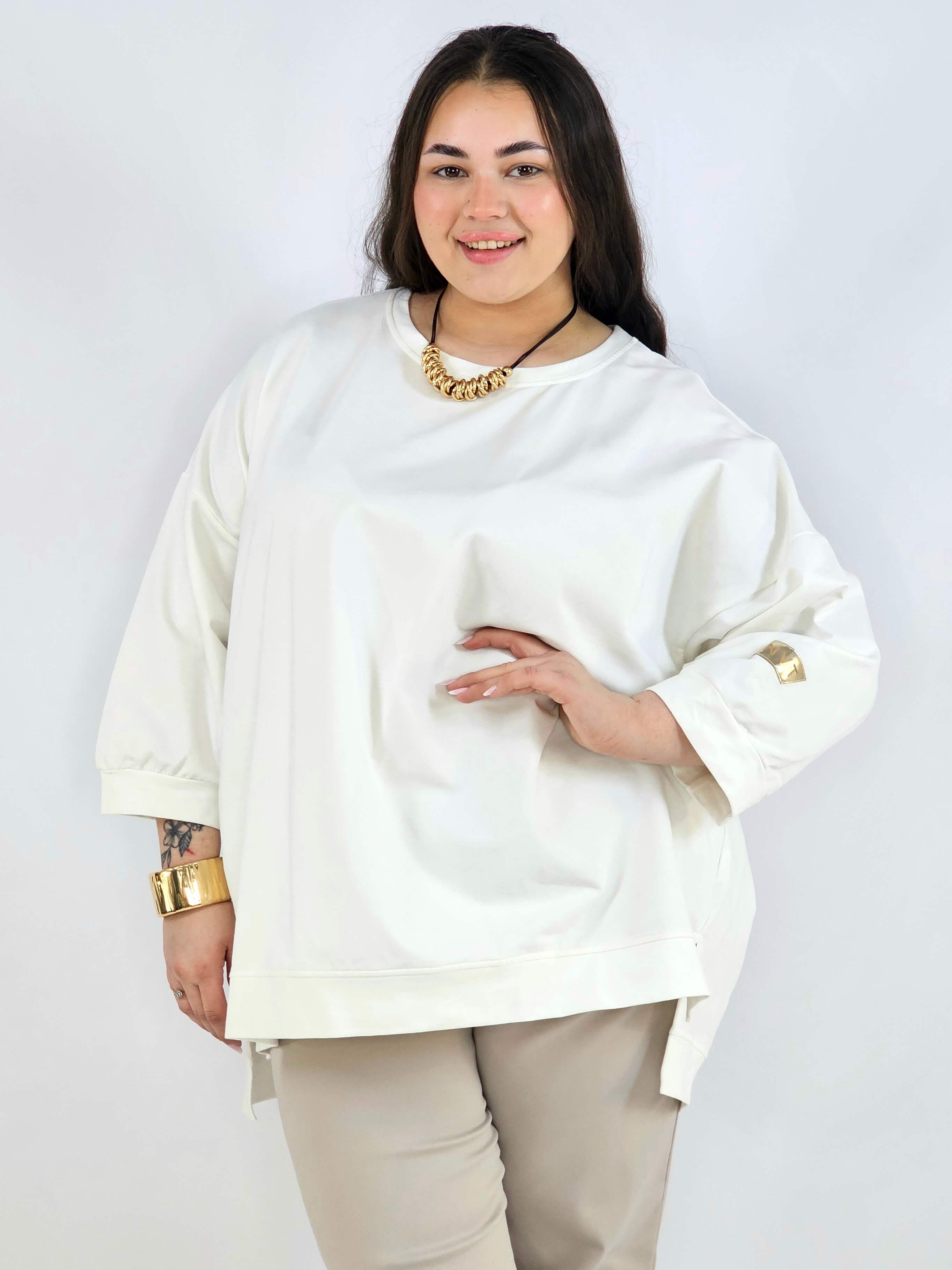 Bluza plus size oversize – kremowa bluza XXL z przedłużanym tyłem Stylowa XL