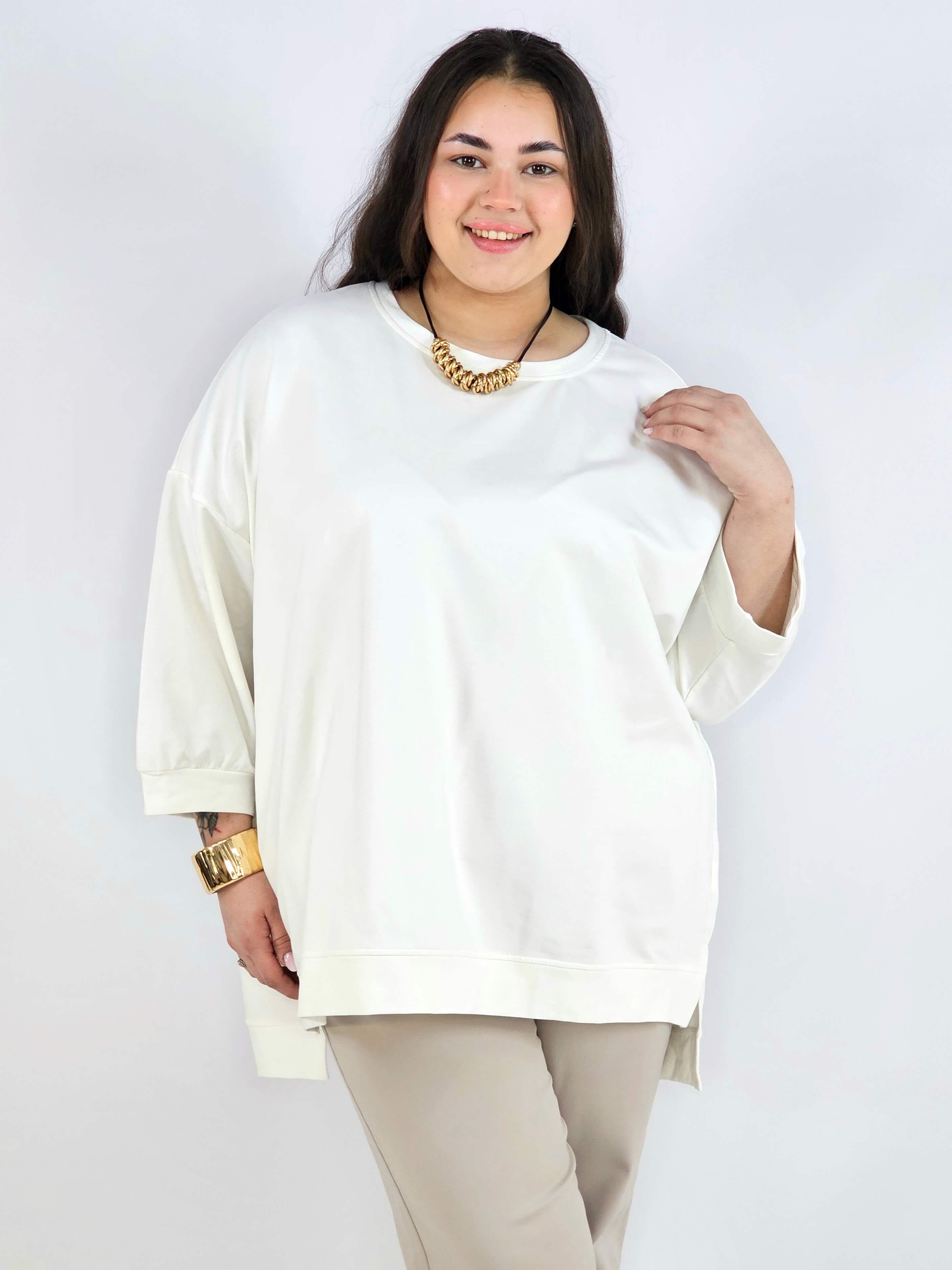 Bluza plus size oversize – kremowa bluza XXL z przedłużanym tyłem Stylowa XL