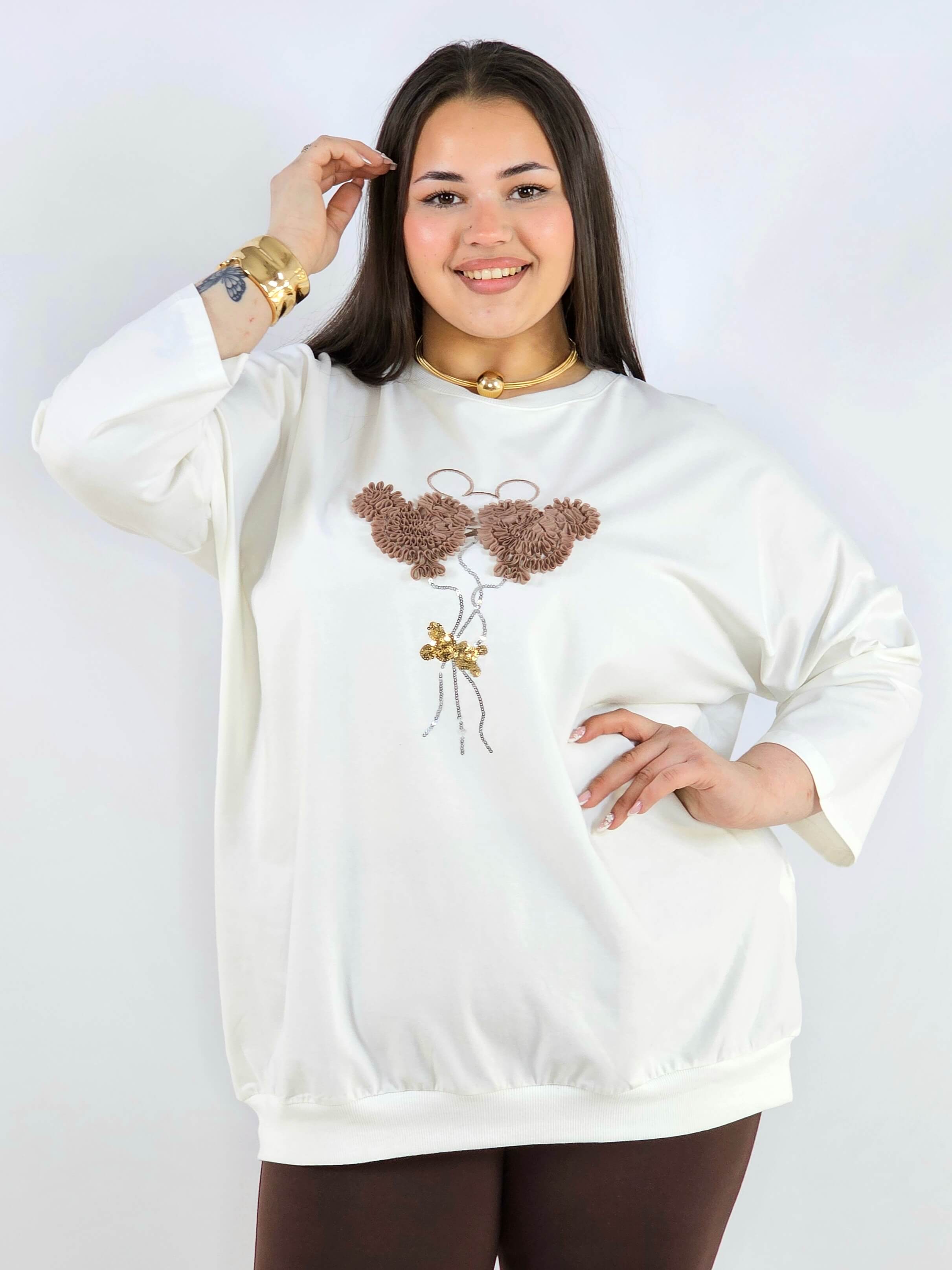 Bluza plus size z ozdobną aplikacją XXL – styl i wygoda Stylowa XL